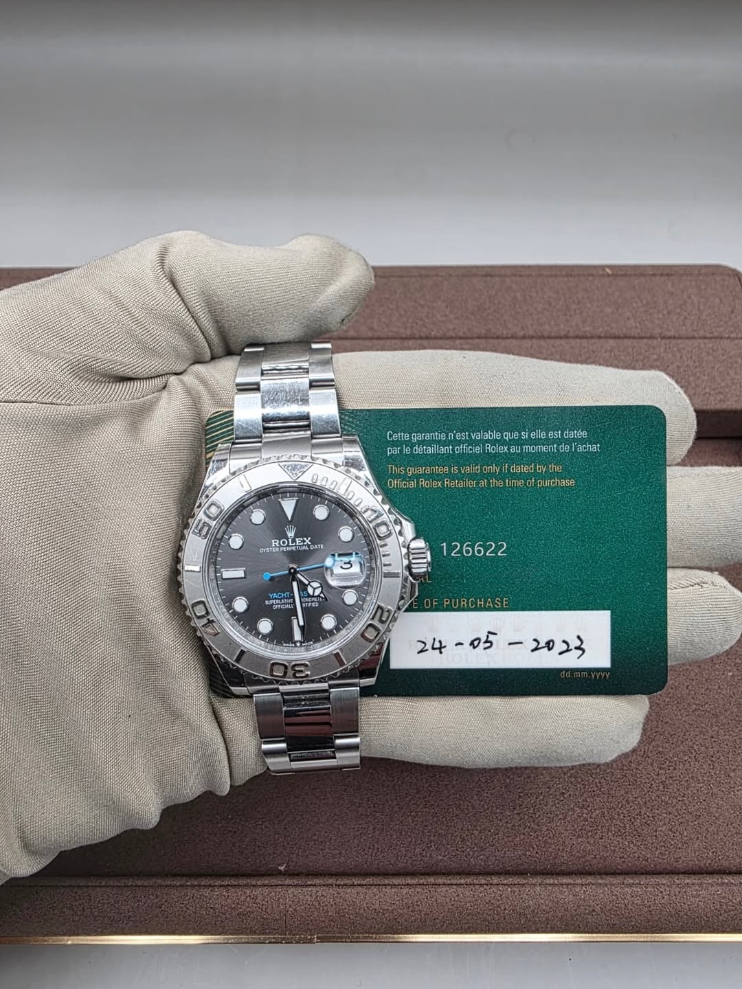 May be an image of wrist watch and text