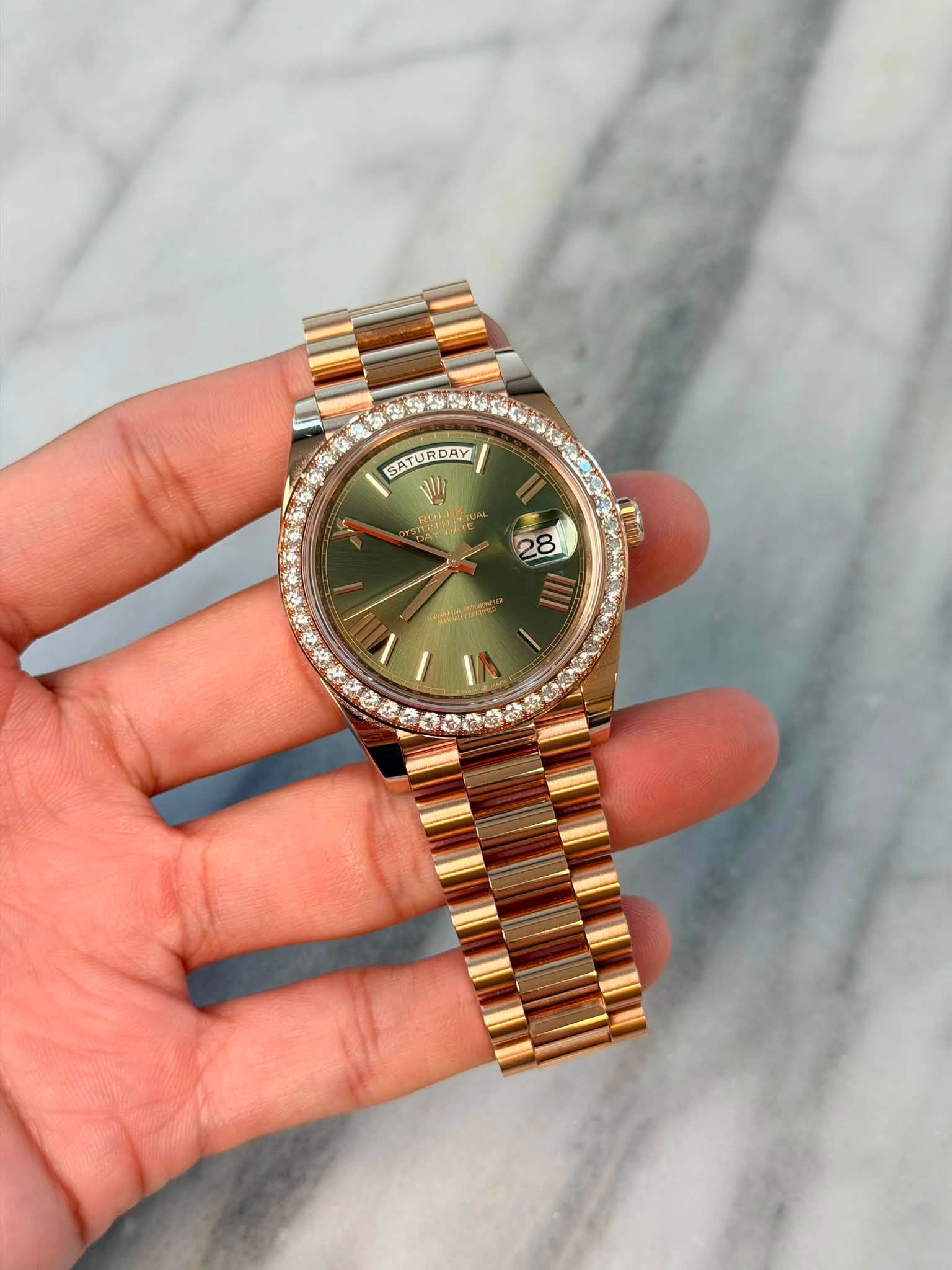 May be an image of wrist watch and text
