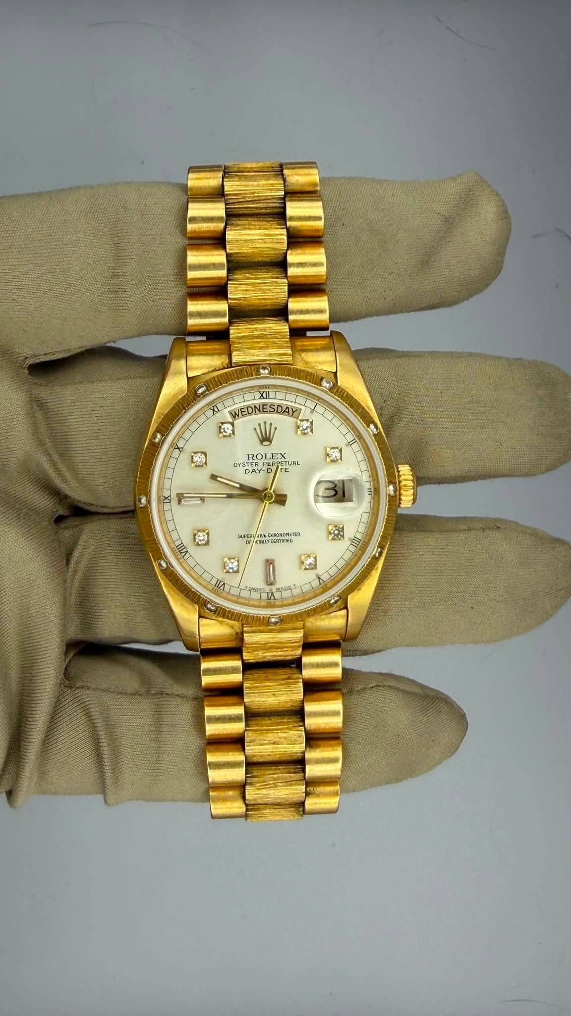 May be an image of wrist watch and text