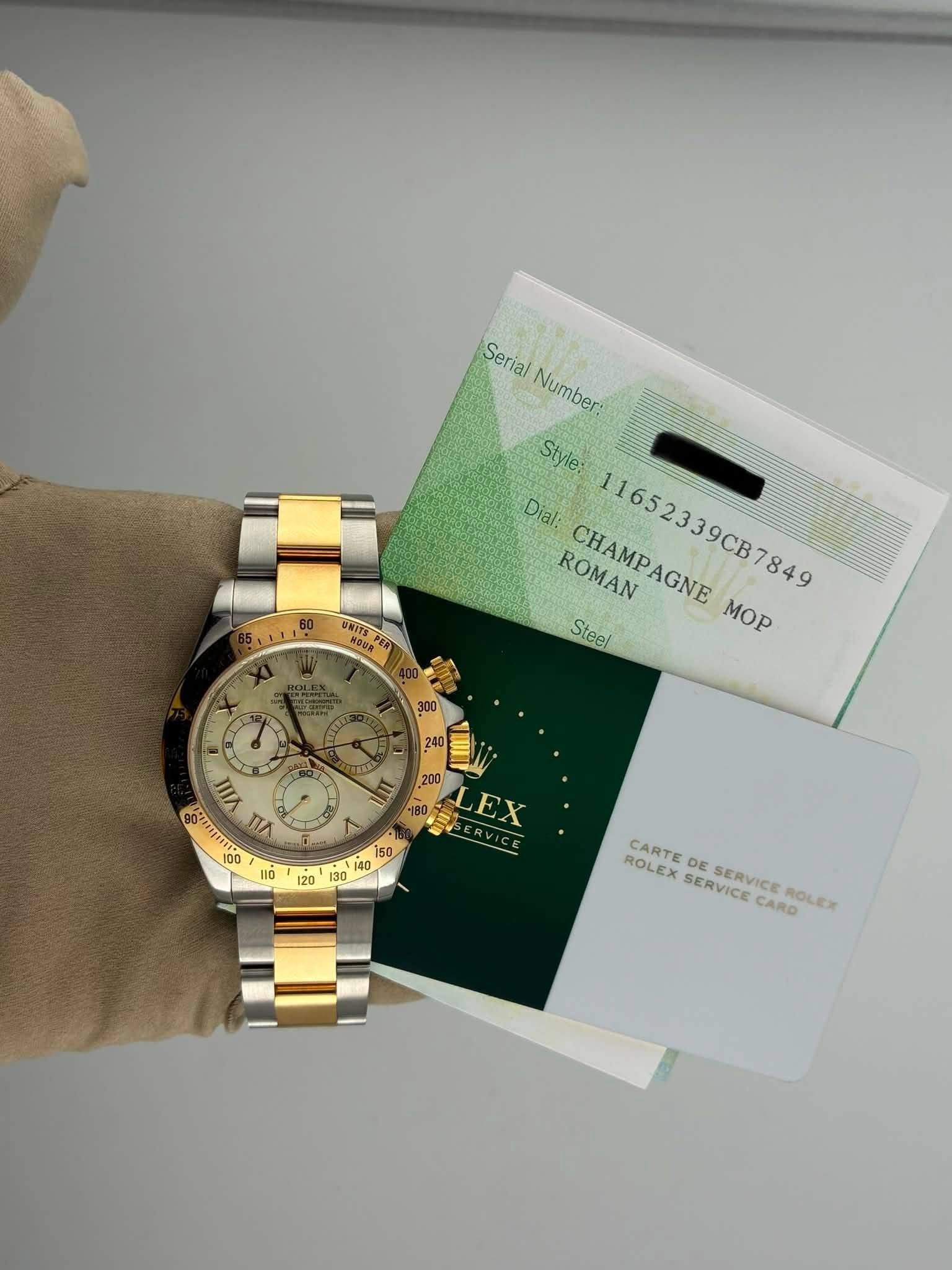 May be an image of wrist watch, money and text that says 'Serial Number: Style: Dial: ROMAN CHAMPAGNE CHAMP 11652339CB7849 AGNE Steel MOP 300 240 或 901111 nл 90-4ุ 100 200 EX ee 50…