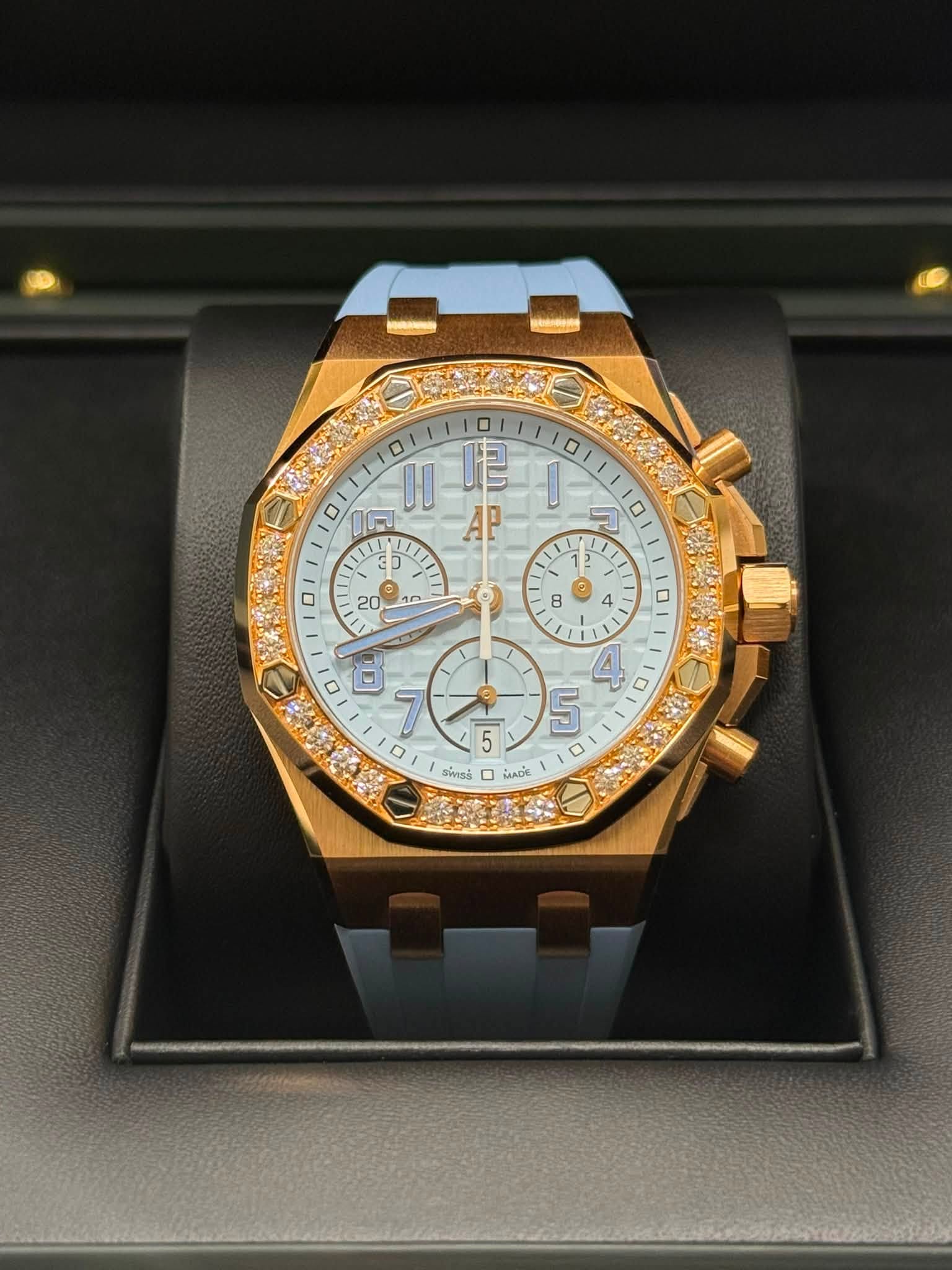 May be an image of wrist watch and text