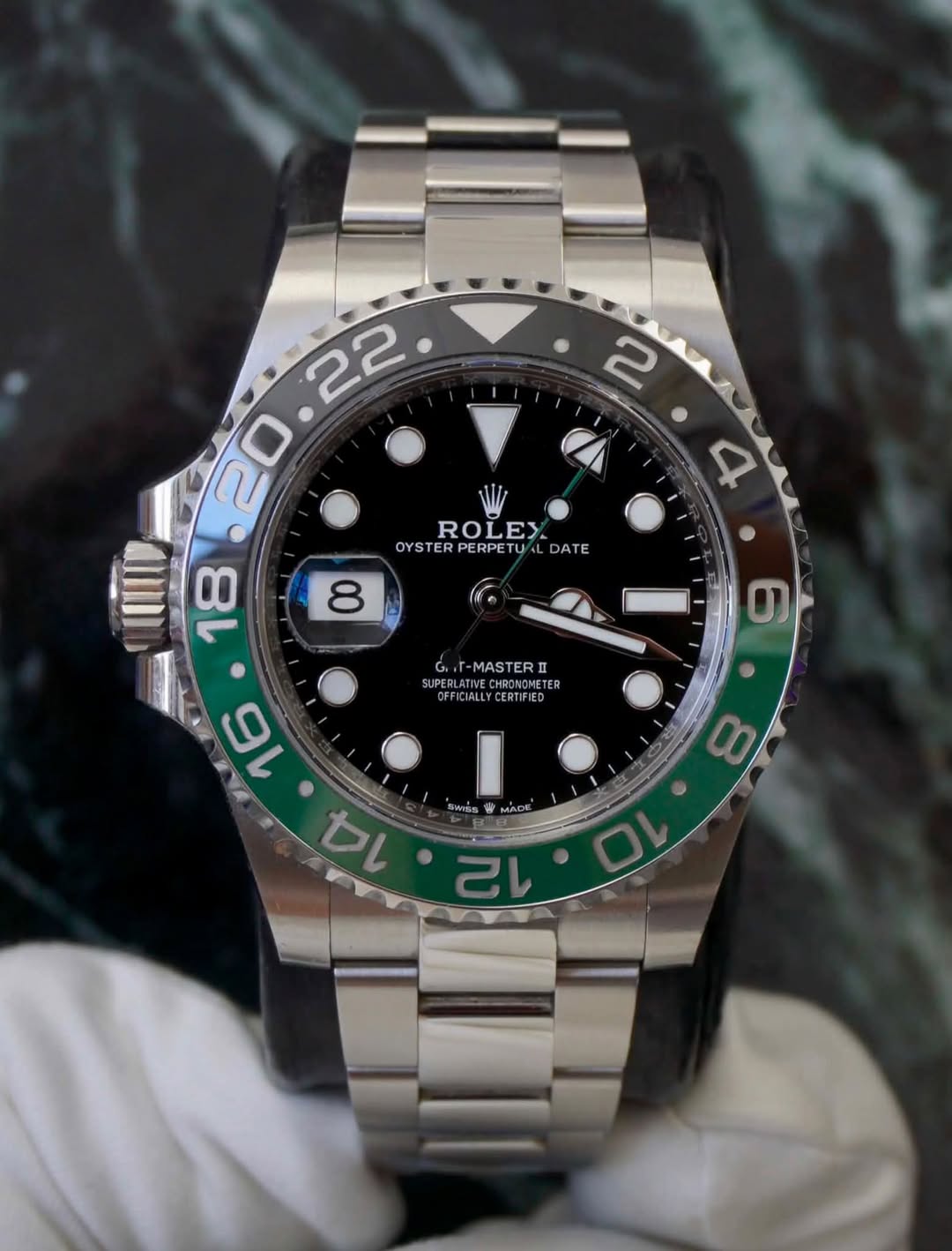 May be an image of wrist watch and text