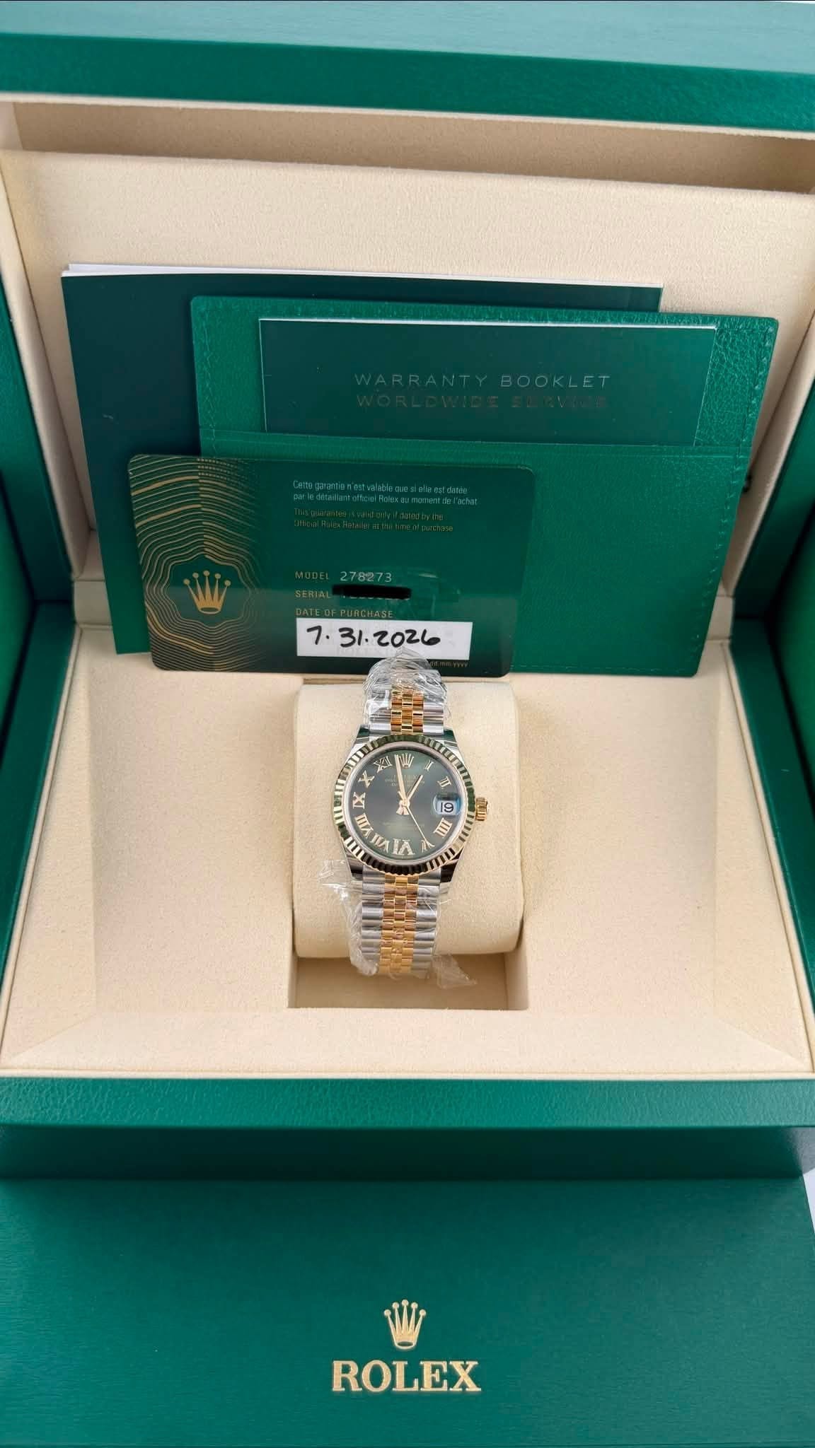May be an image of wrist watch and text that says 'BOOK 一音 감을 4 스 19 ፕ SS NITT IA ROLEX'