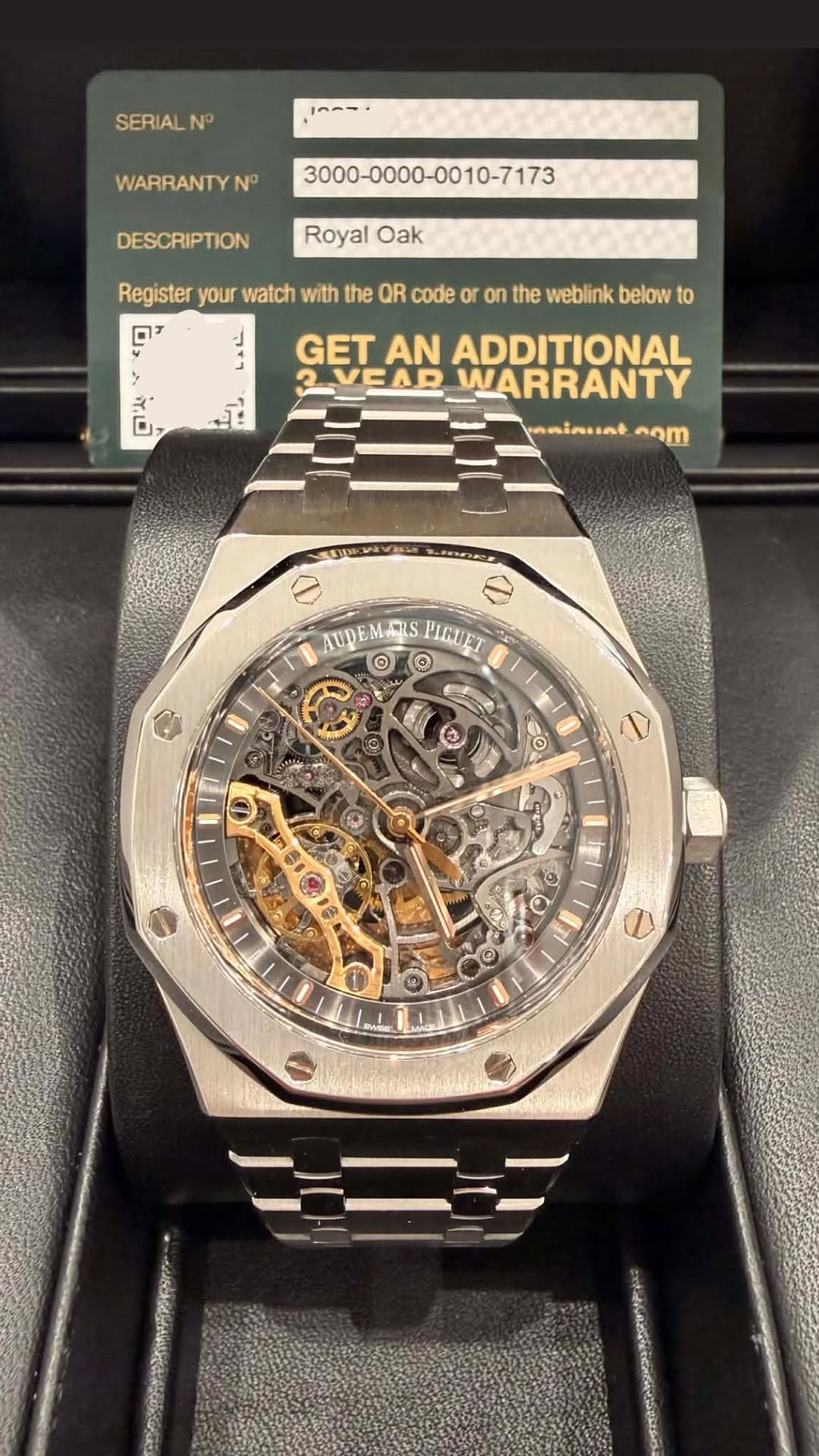 May be an image of wrist watch and text that says 'SERIAL WARRANTY N DESCRIPTION Royal Oak Register your watch with the QR code or O ים the weblink below to ダ GET AN ADDITIONAL…