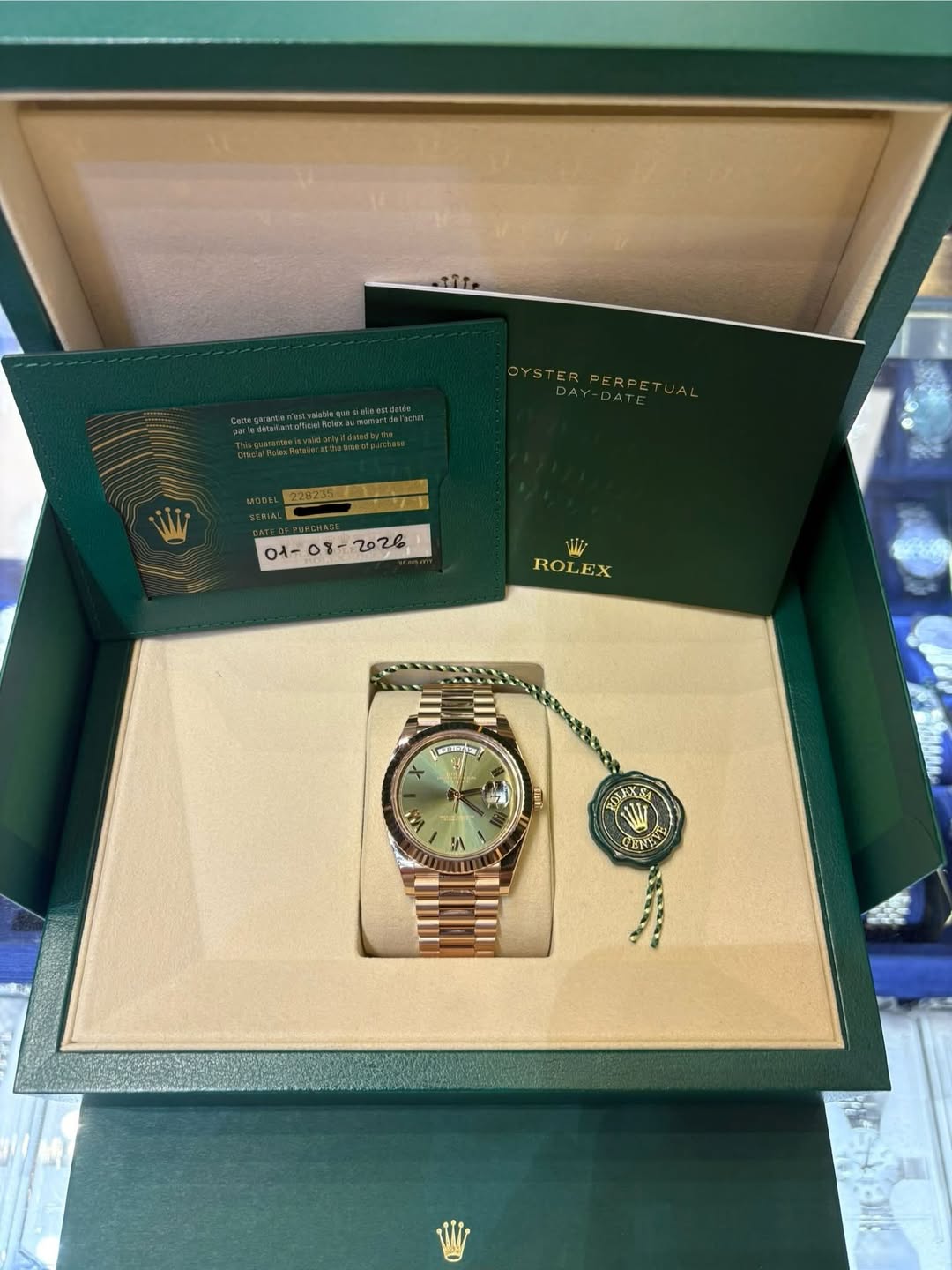 May be an image of wrist watch and text