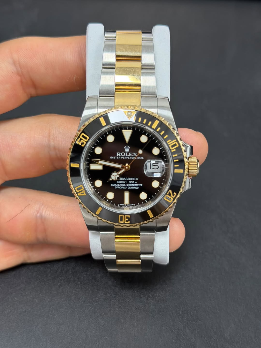 May be an image of wrist watch and text that says '50 IMZ ROLEX EX OYSTE OYSTER PERPETUALDA DATE 10 5 BMARINER PERLATIVE ROROME ា 300m OFFICIALL OFTICIALIYCT CERTIFIED 40 α ናኛ 20…