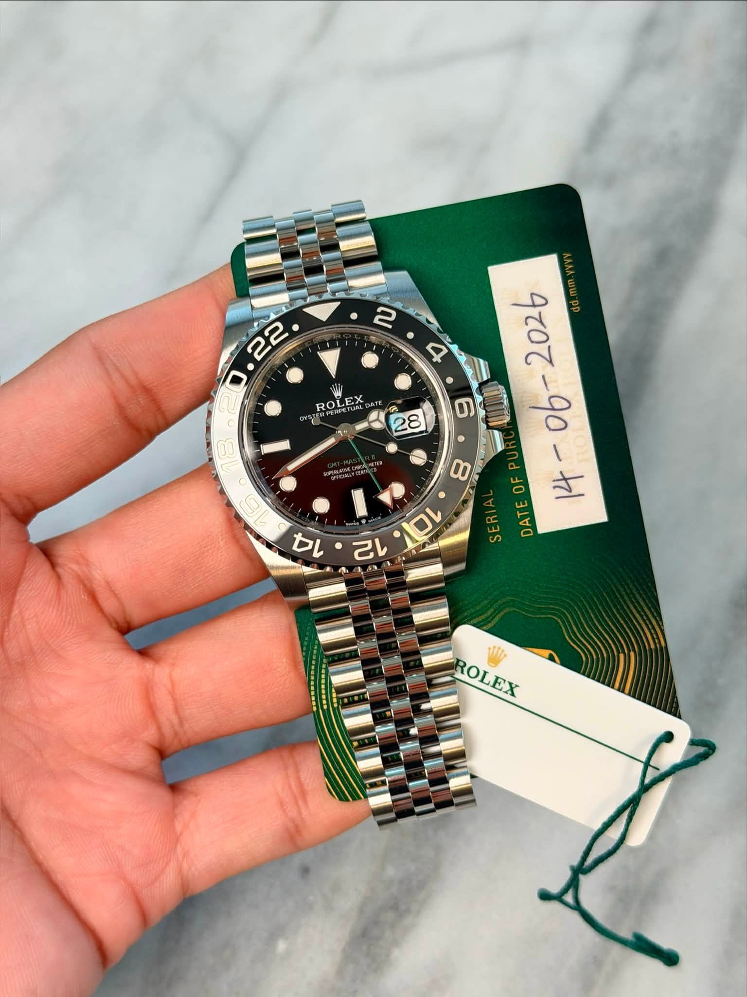 May be an image of wrist watch and text that says '2 22 4 ROLEM H X ROLE oAy 28 2026 ៣ា UI 0f 00 OF SERI DATE 12 Di ROLEX'