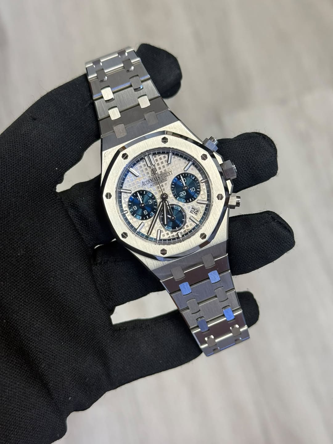 May be an image of wrist watch and text