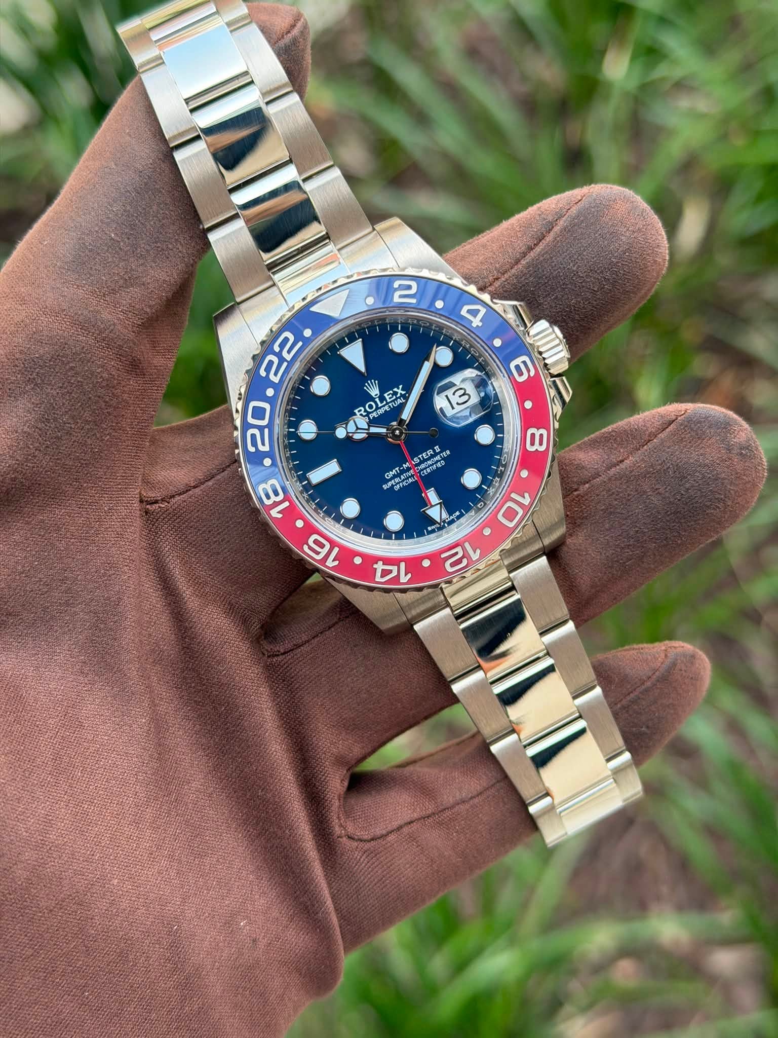 May be an image of wrist watch and text