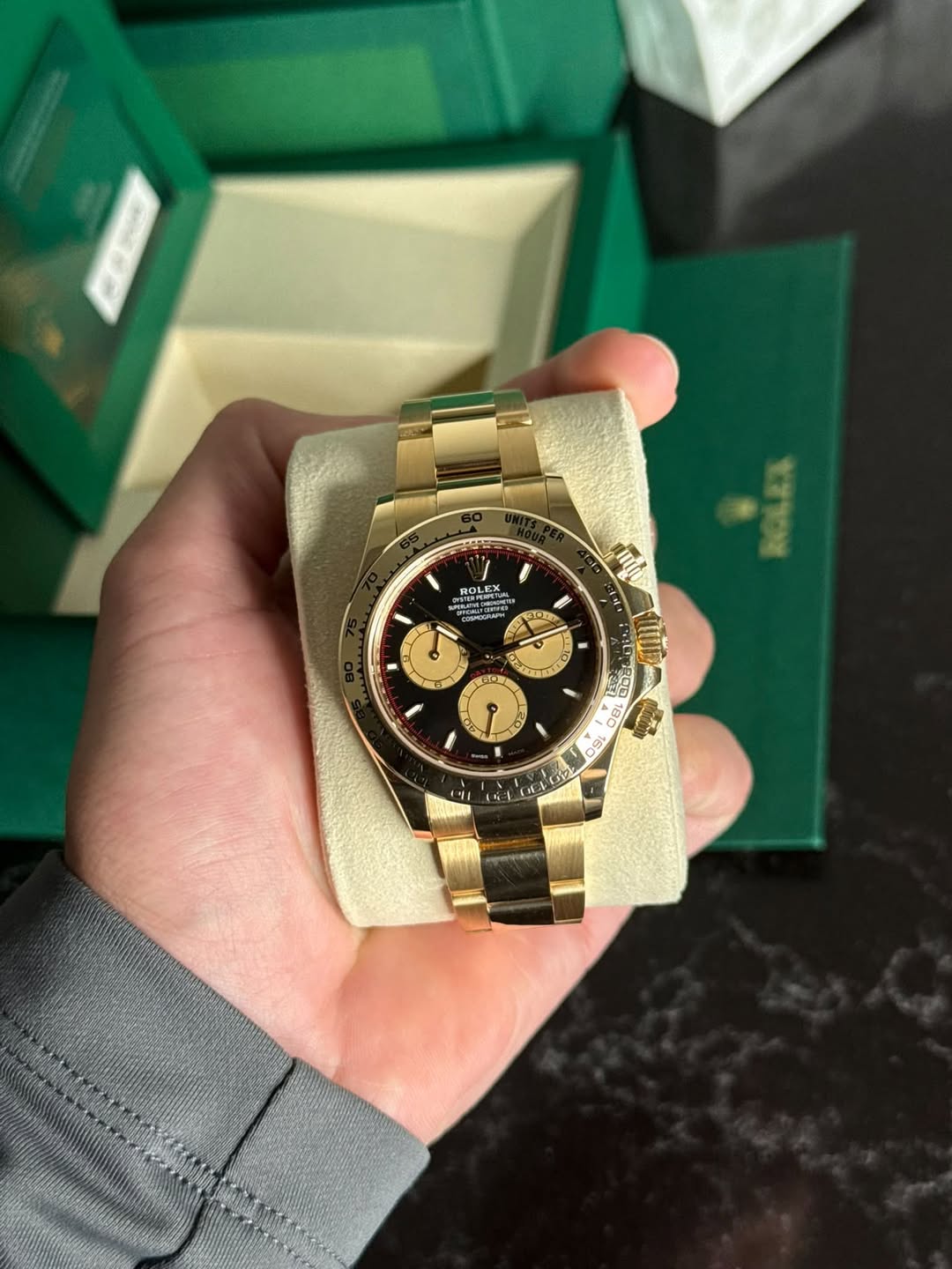 May be an image of wrist watch and text