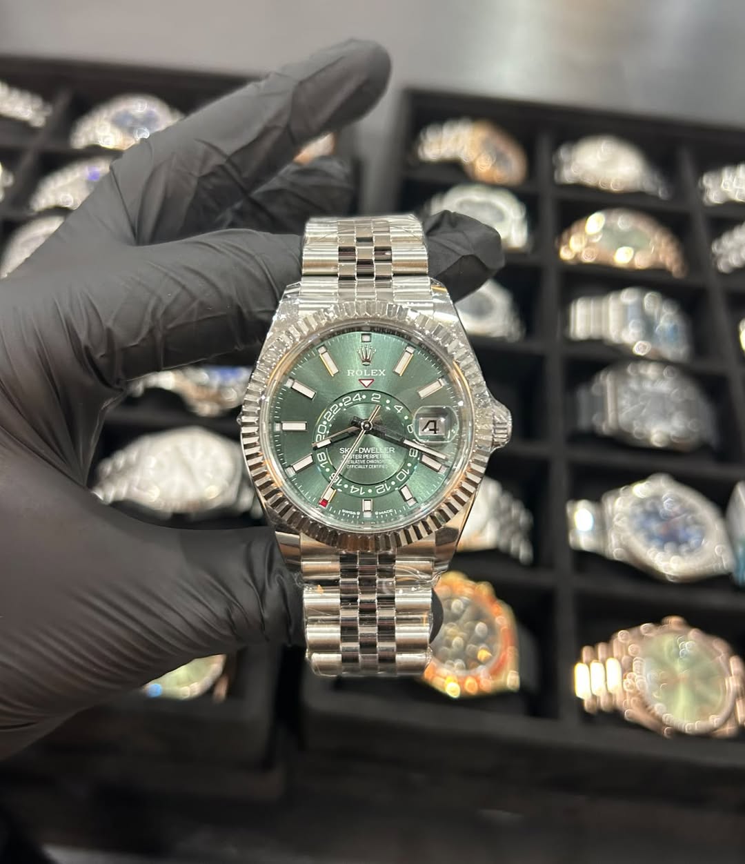 May be an image of wrist watch and text
