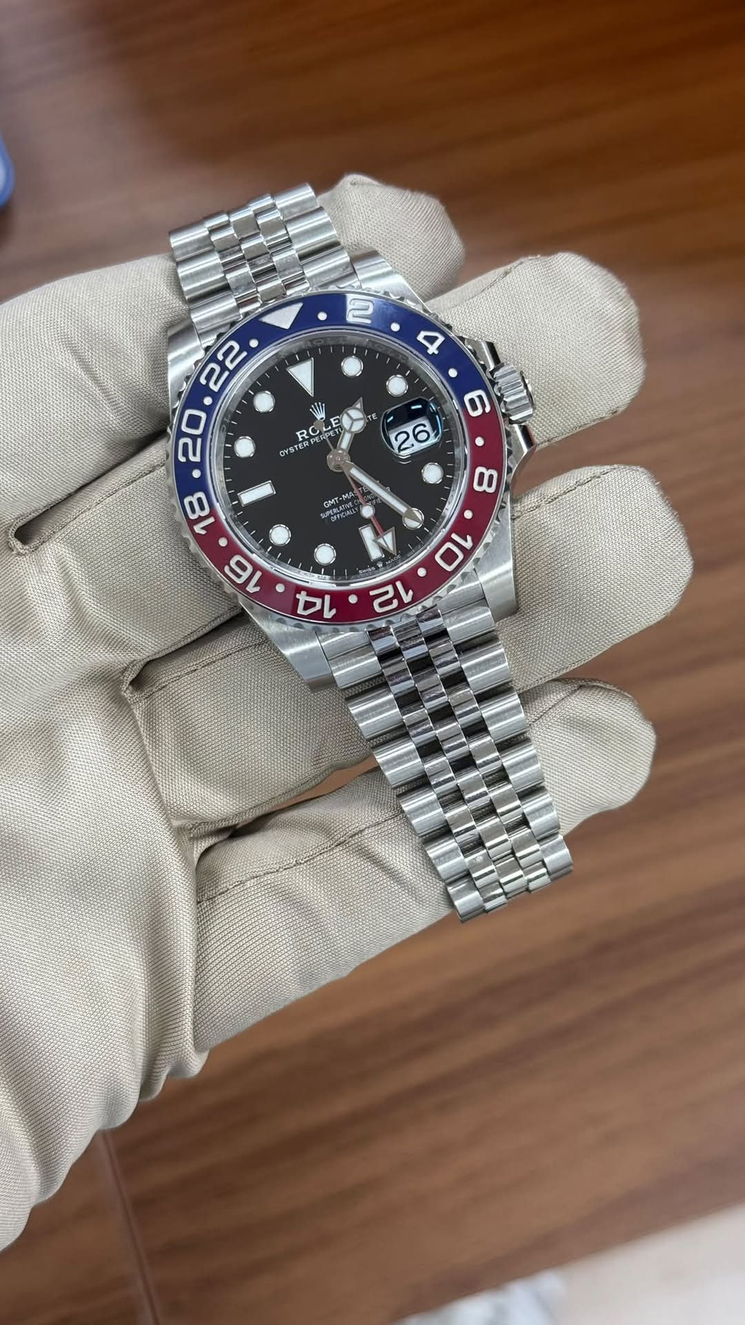 May be an image of wrist watch and text