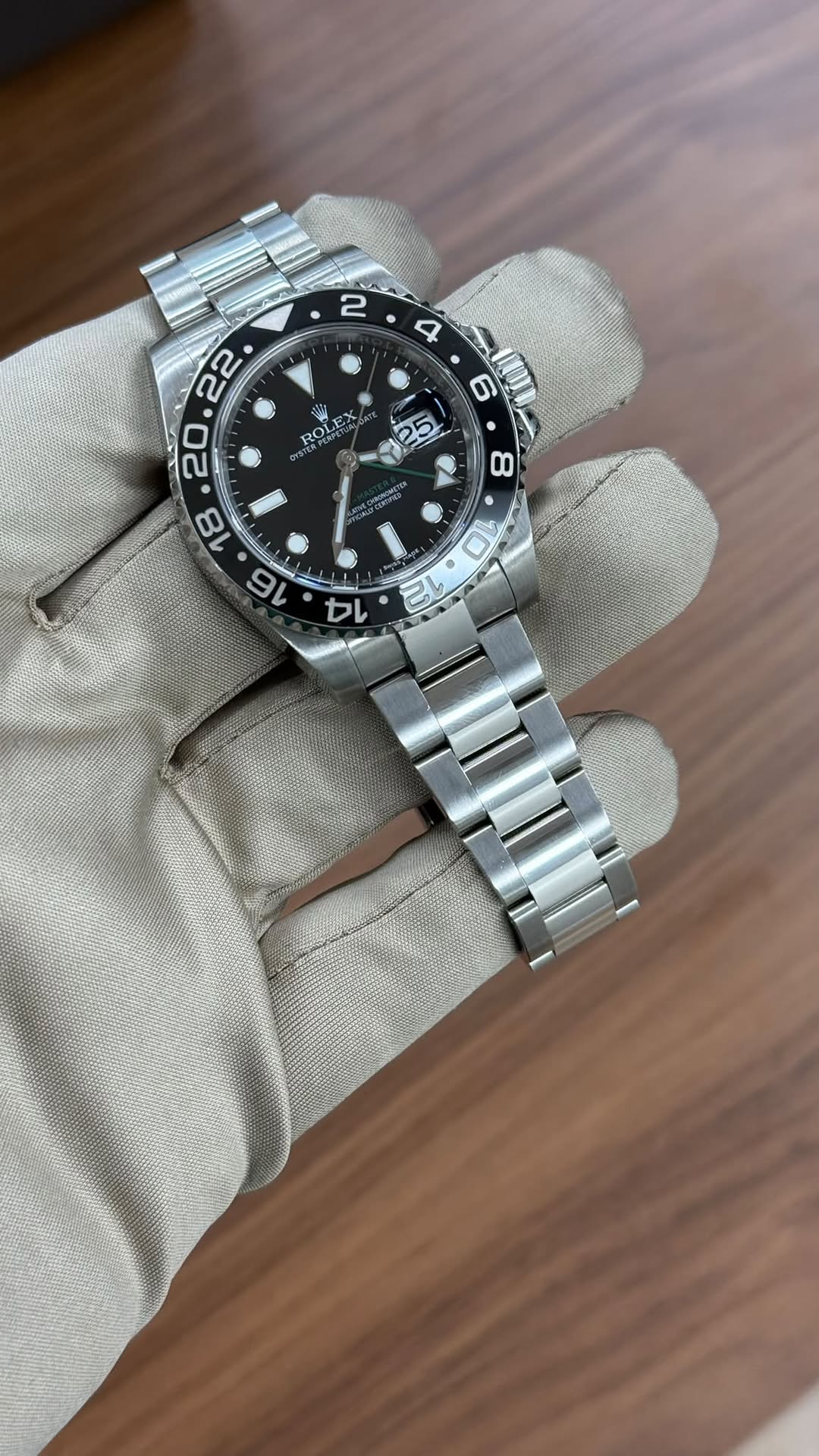 May be an image of wrist watch and text