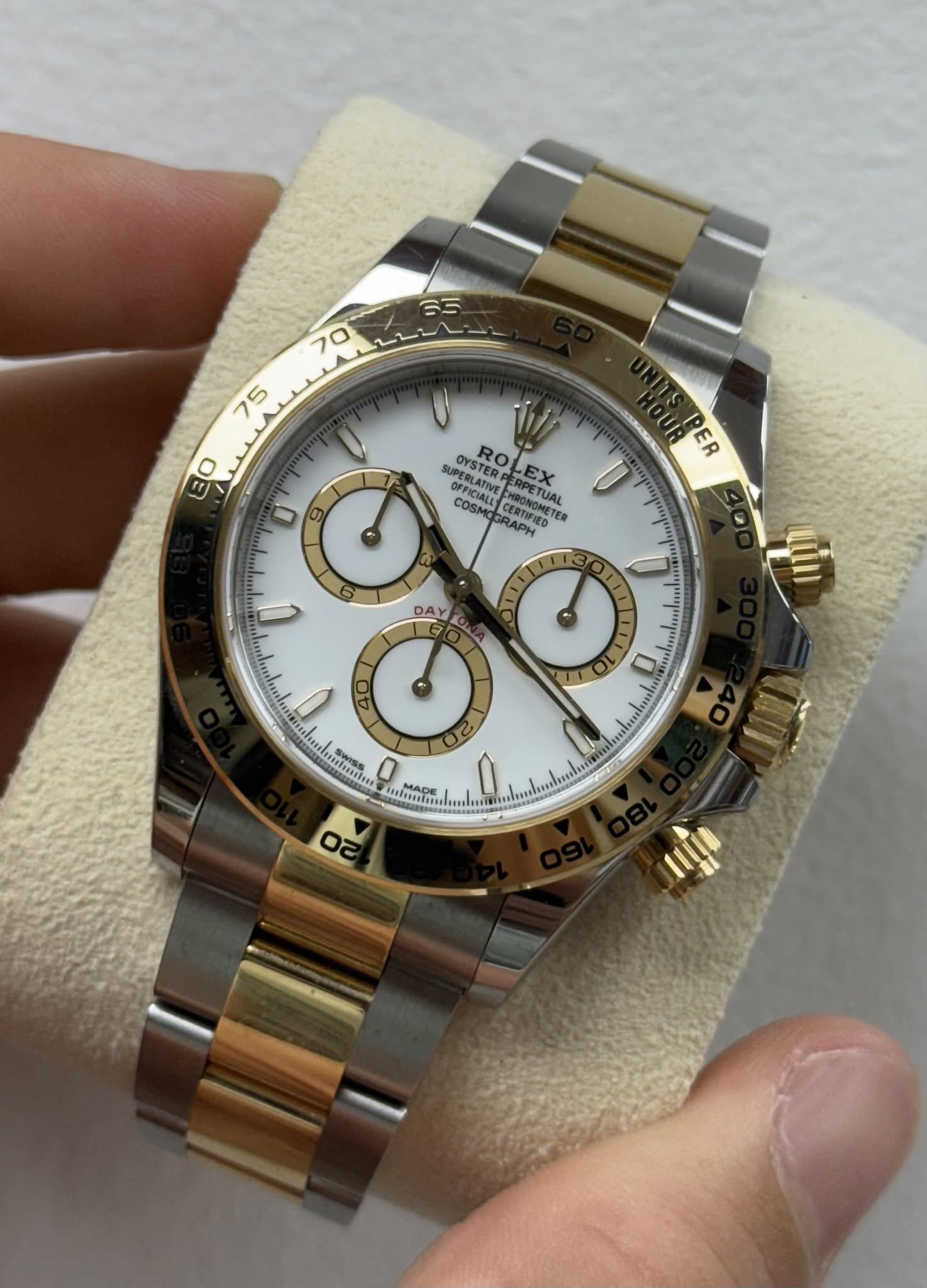 May be an image of wrist watch and text