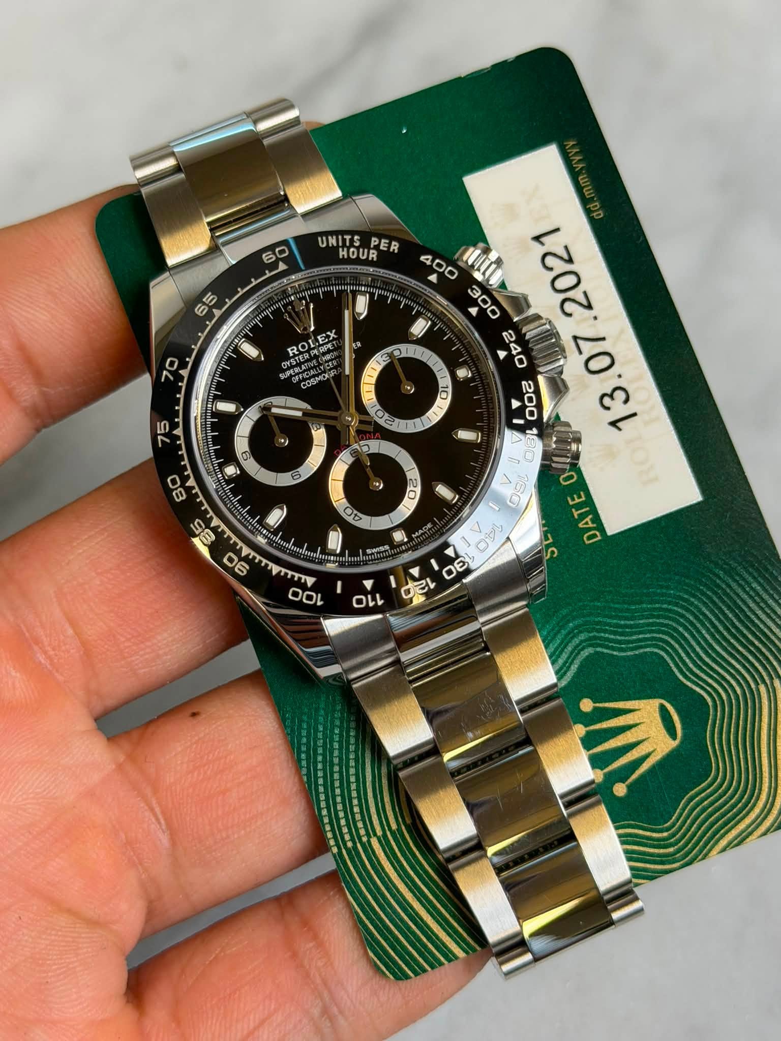 May be an image of wrist watch and text that says '60 UNITS HOUR PER 65 400 mitu TILE I B 1 0 り 0E 80 85 90 0V 미 p DE! ロン! E E DAT 100 مد 110 በ'