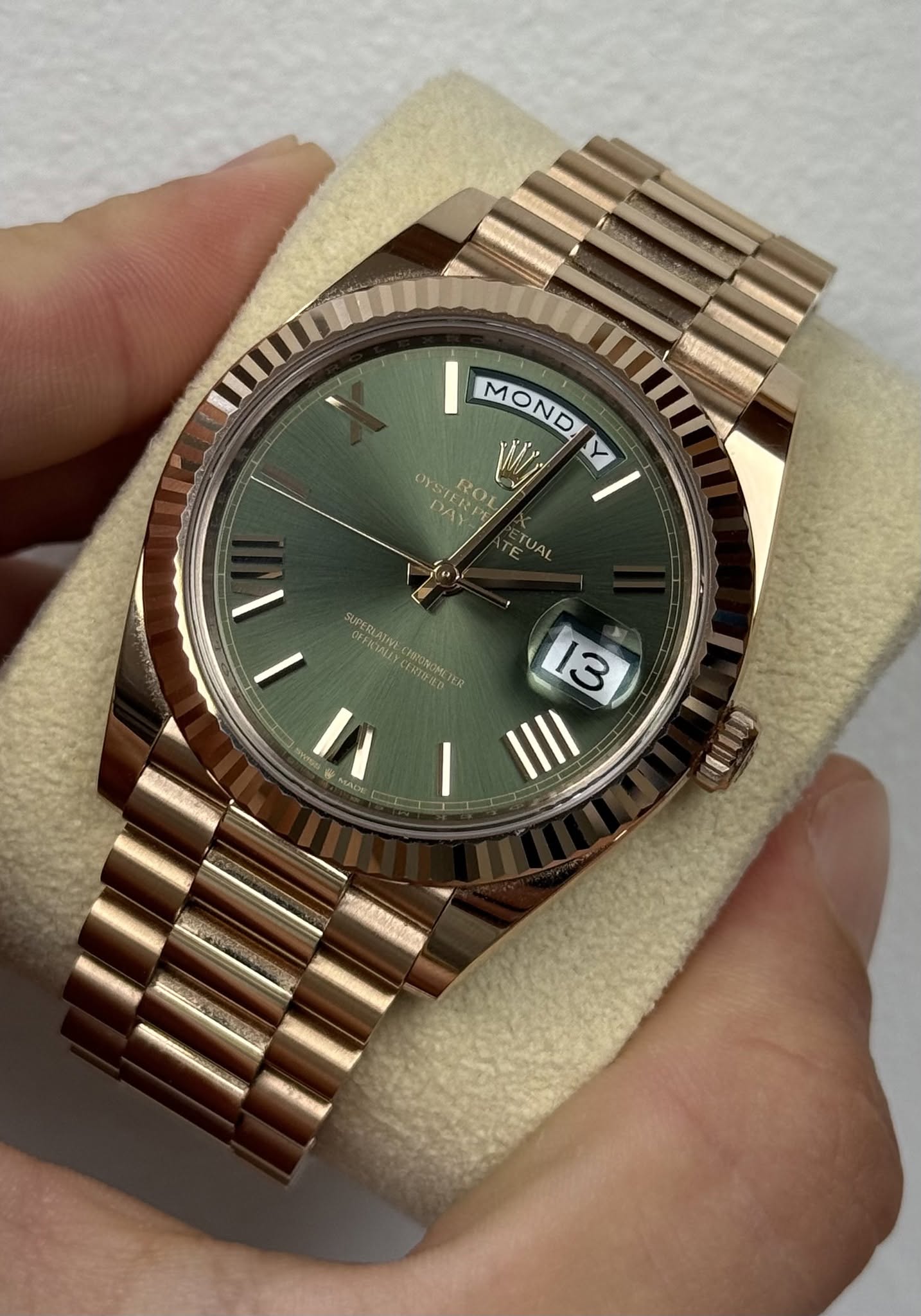 May be an image of wrist watch and text