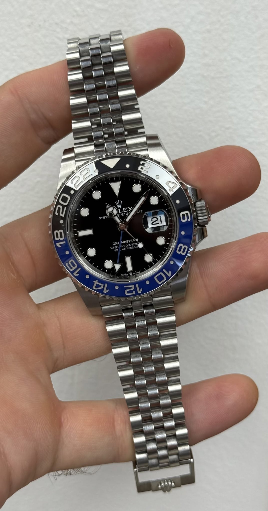 May be an image of wrist watch and text