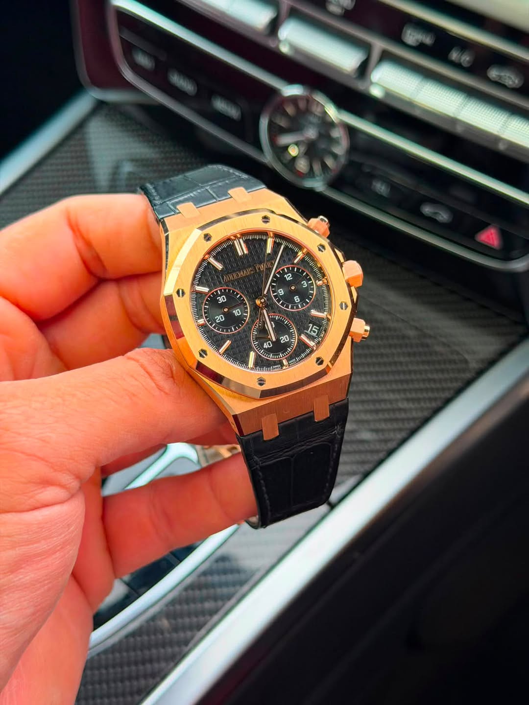 May be an image of wrist watch and text