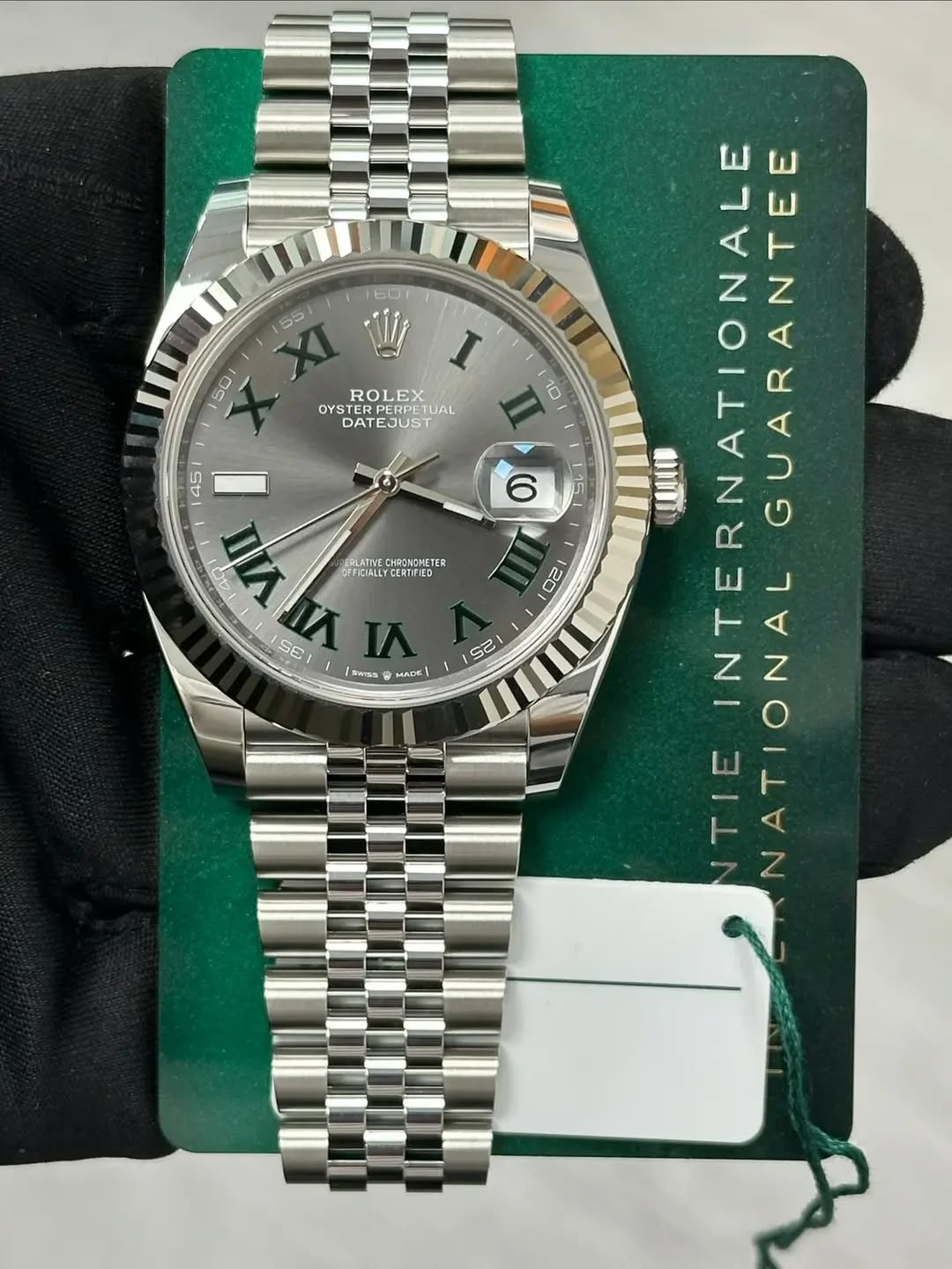 May be an image of wrist watch and text that says ' I ROLEX OYSTE OYSTERPE PERPETUA PETUAL DATEJUS JUS DATE 10 6 45 nЛлA RELATINE FLATIVECHRINEME CHRINCMETER ゴ EFICIALLY…