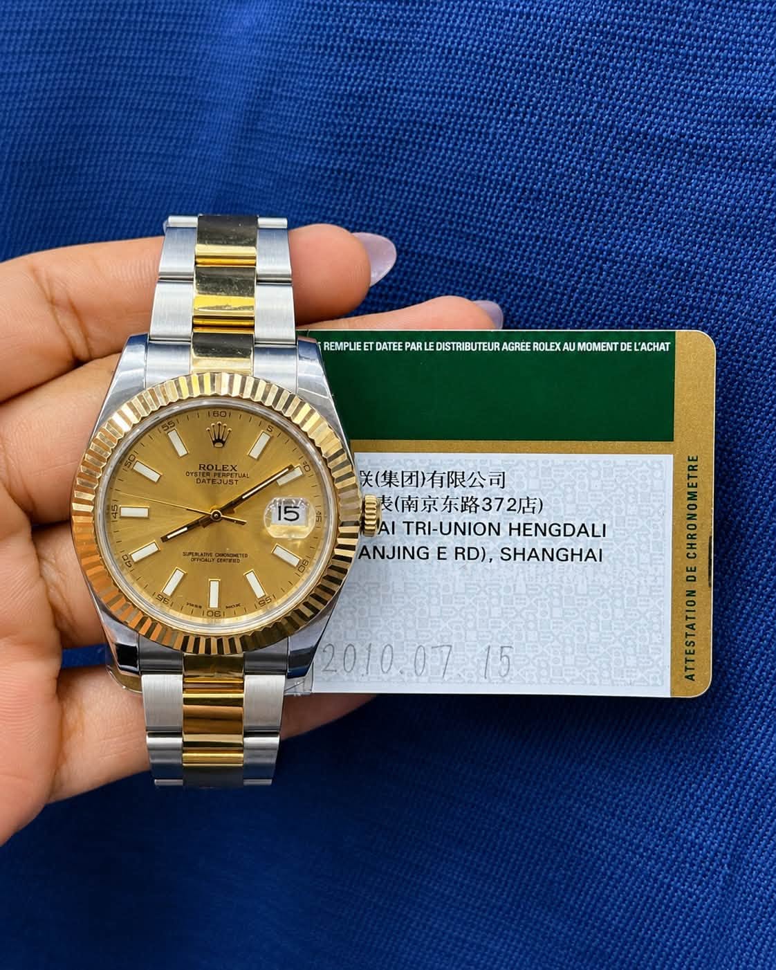 May be an image of wrist watch and text that says 'FEPFETERERTS MOMENT DE L'ACHAT REMPLIEE DATEE ROLEXA R LEX DYSTATE TBIERHUNIST PEPETИA PETUAL 15 ATO መስ" 美(集团)有限公司 表(南京东路372店)…