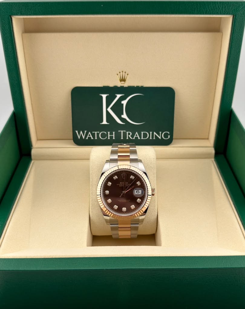 May be an image of wrist watch and text that says 'KC WATCH WATCHTRADING TRADING មាំ Ry 9 ទ 6 福 ت @ ©'