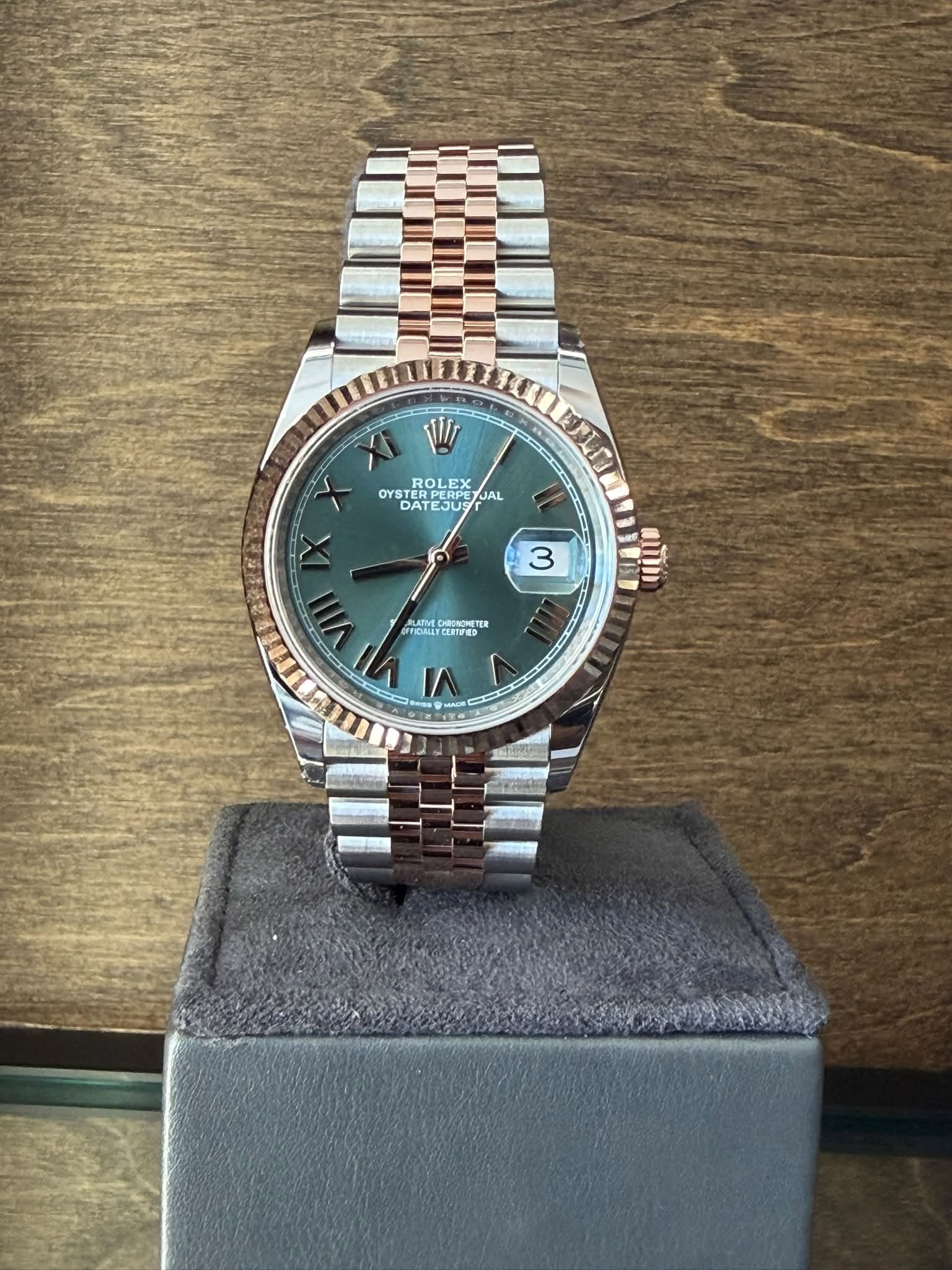 May be an image of wrist watch and text