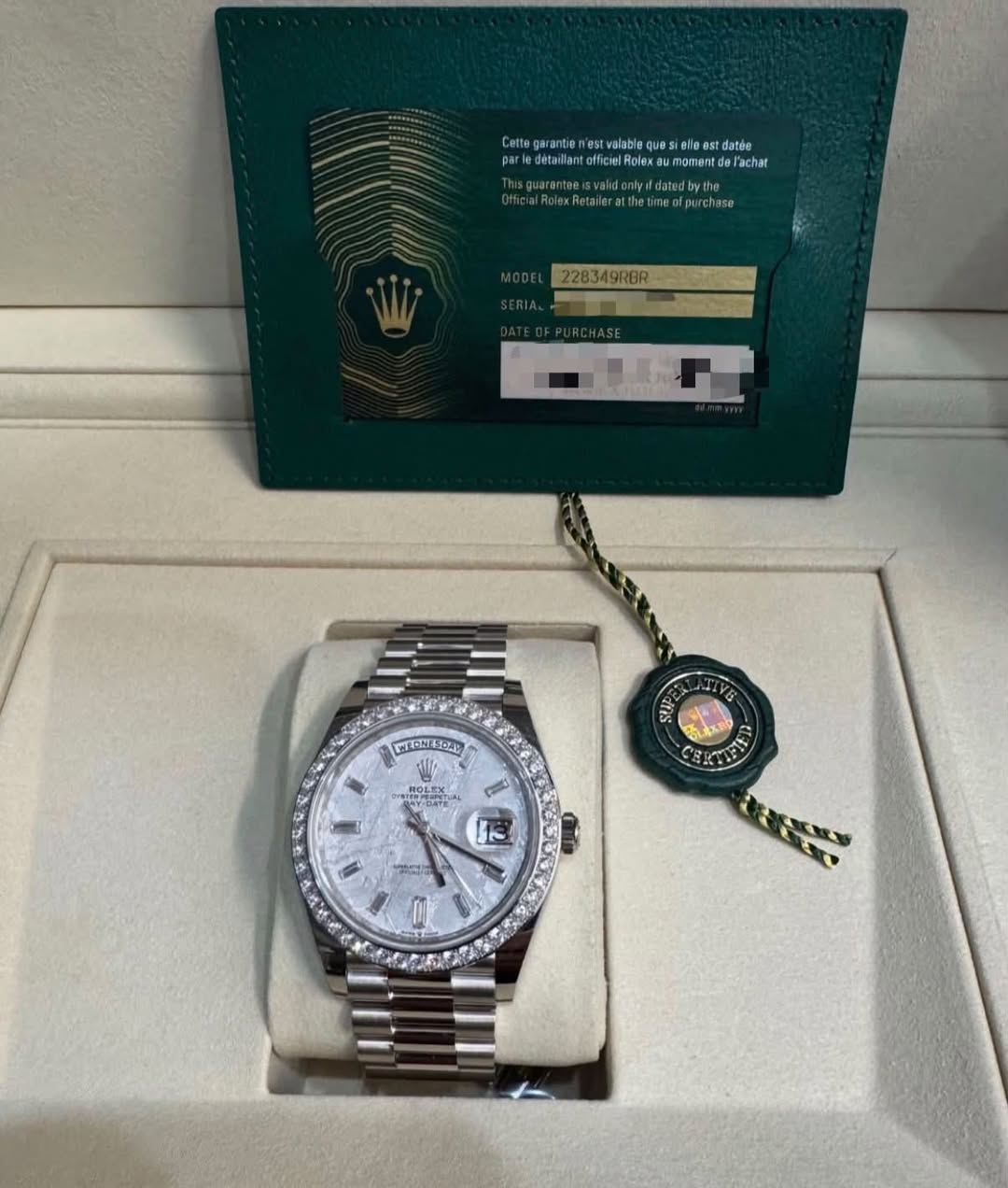 May be an image of wrist watch and text