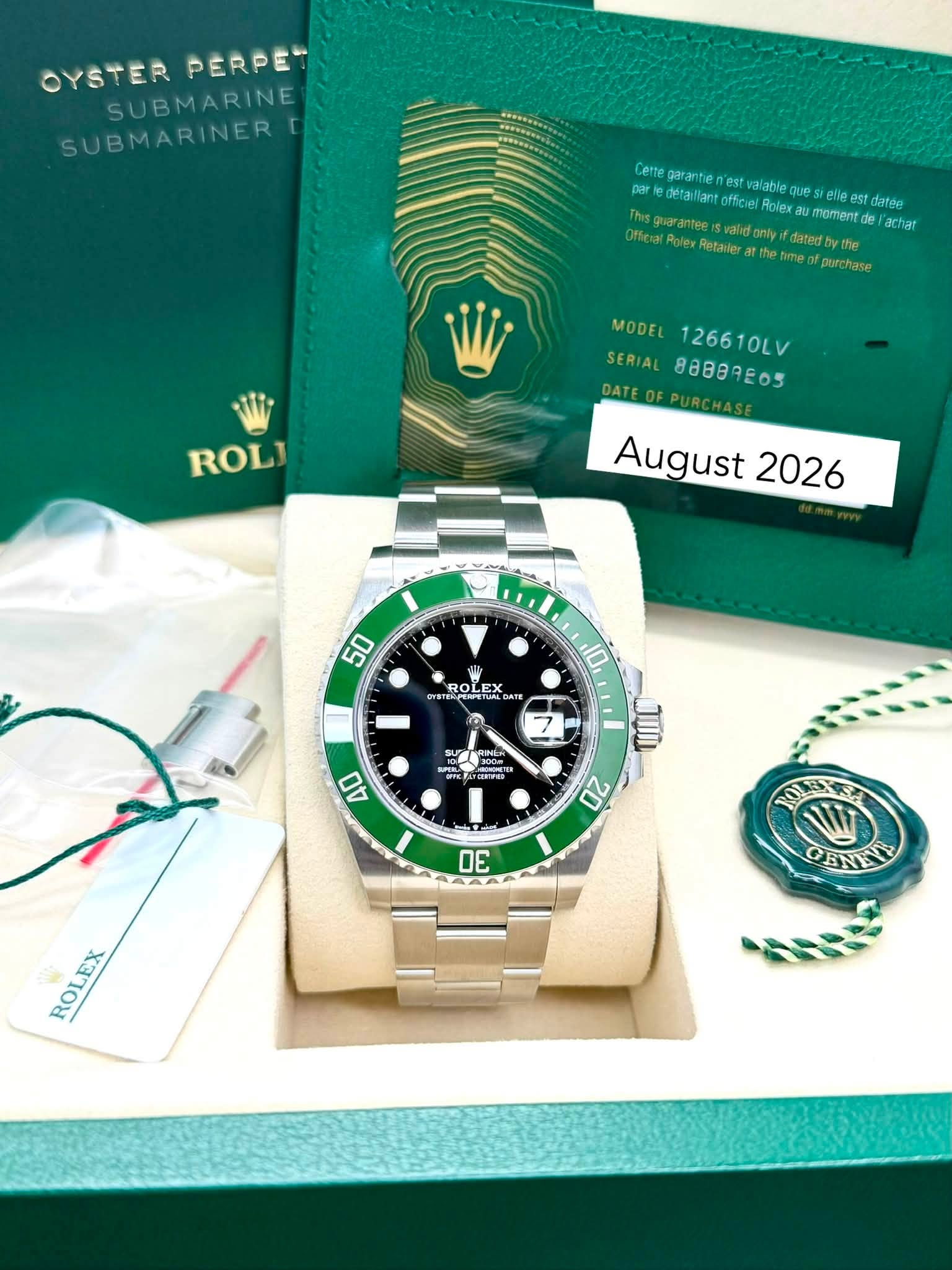 May be an image of wrist watch and text that says 'OYSTERPERPE OYSTER PERPET SUBMARINE SUBMARINER Cette garantie valable detaillan detaillantofficiel que UP elle officier Rolex…