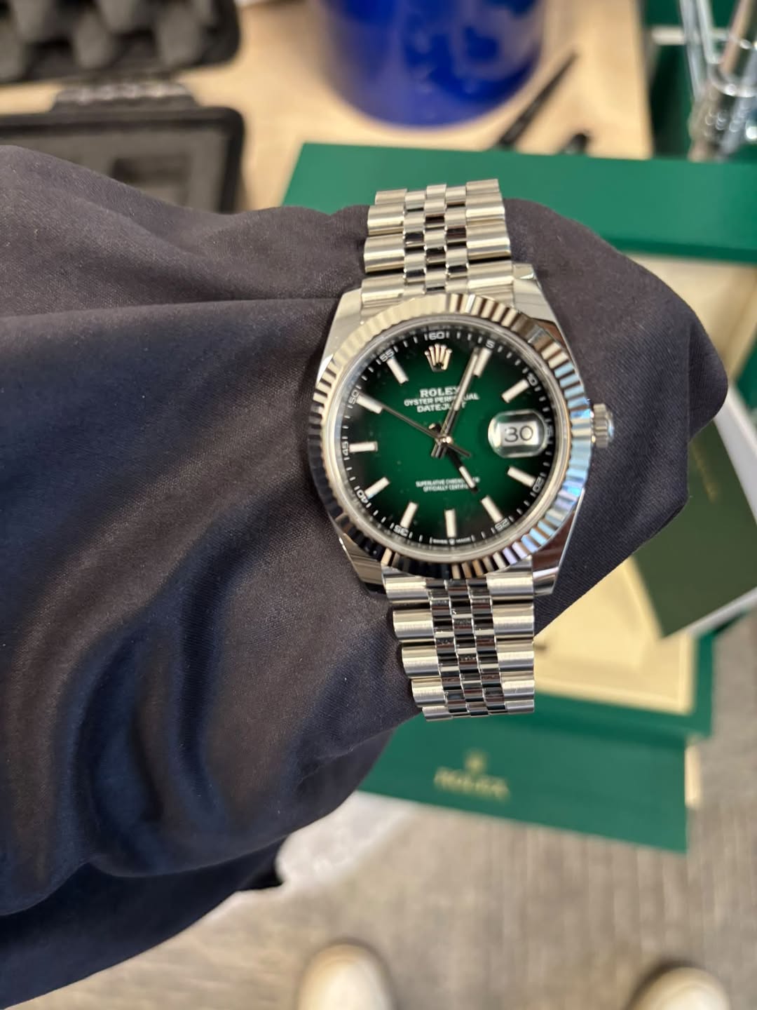 May be an image of wrist watch and text