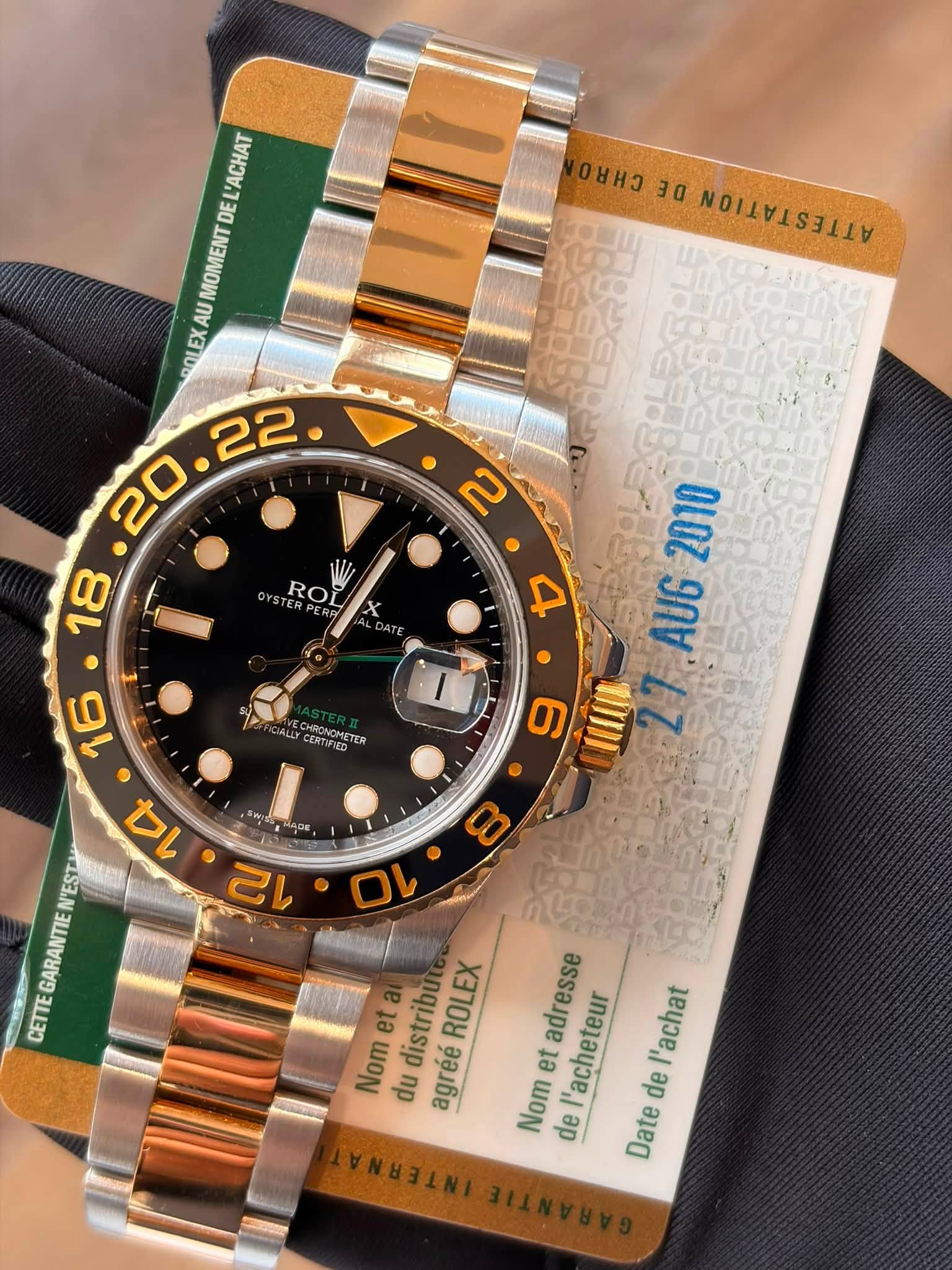 May be an image of wrist watch and text that says 'ยนว 30 AATTATITITA L'ACHAT DE MOMENT X ROLE ROI X ATE 4 ALLY CERTIFIED CRNGALTER INCMETER 2010 AUG2 AUG 6 III ADE LLTTTTTTTTT…