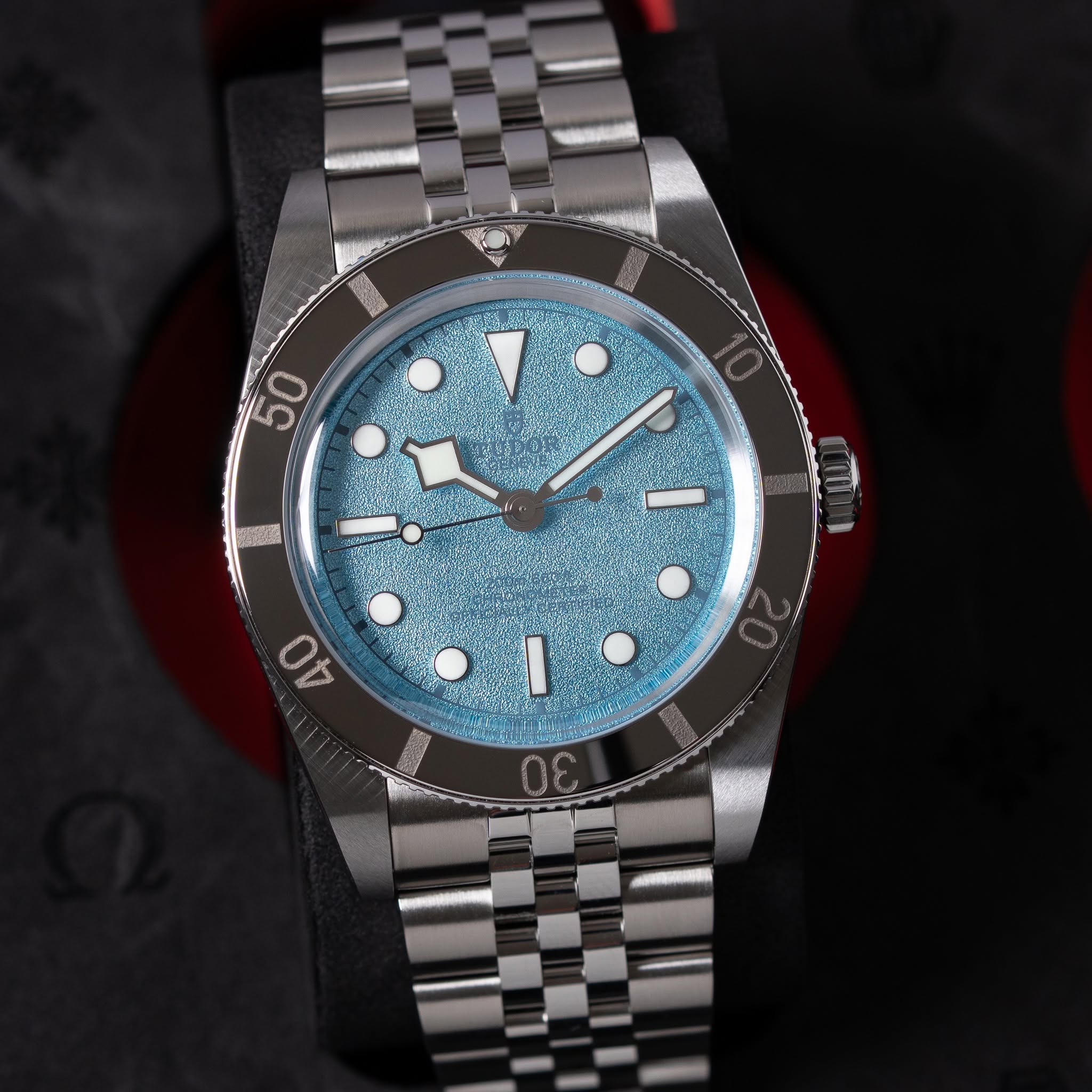 May be an image of wrist watch and text