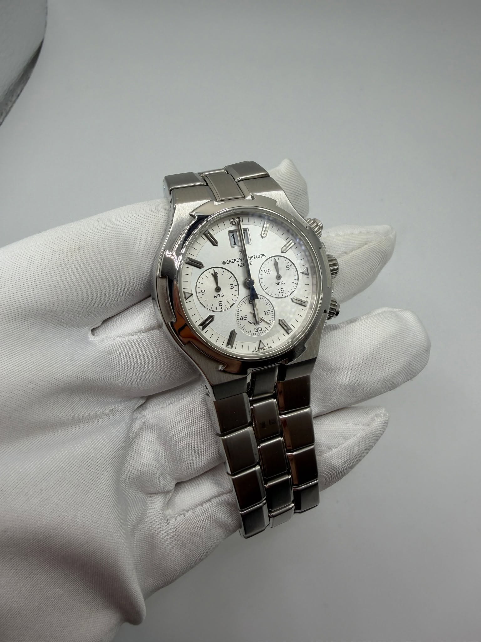May be an image of wrist watch and text
