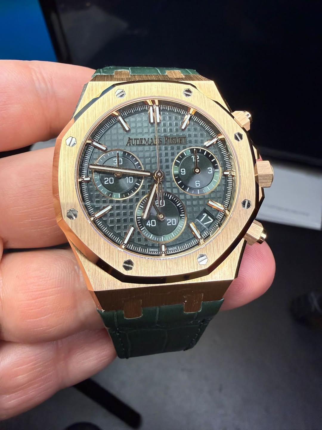 May be an image of wrist watch and text