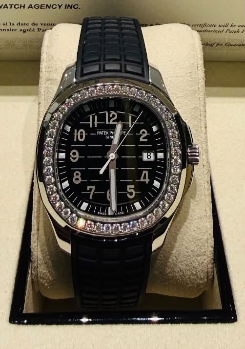 May be an image of wrist watch and text