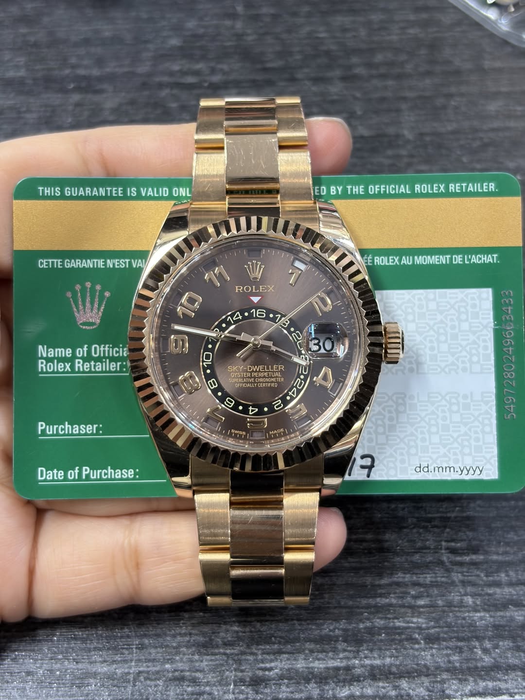 May be an image of wrist watch and text that says 'THIS GUARANTEE IS VALID ONL ED BY THE OFFICIAL ROLEX RETAILER. CETTE GARANTIE N'EST VAI ١٠٠١٠١ 11 RO ROLEX EX ማ 4 16 1 3 Name of…