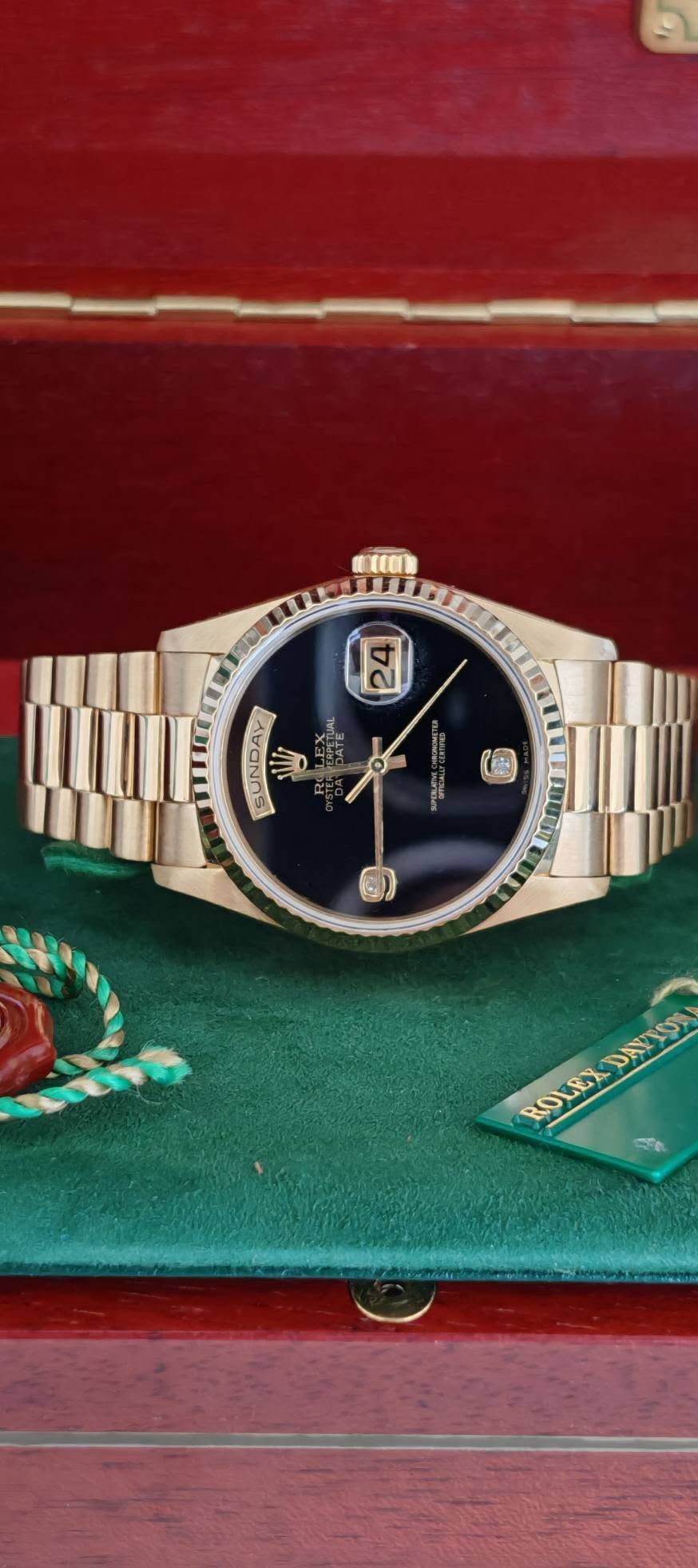 May be an image of wrist watch, jewelry and text