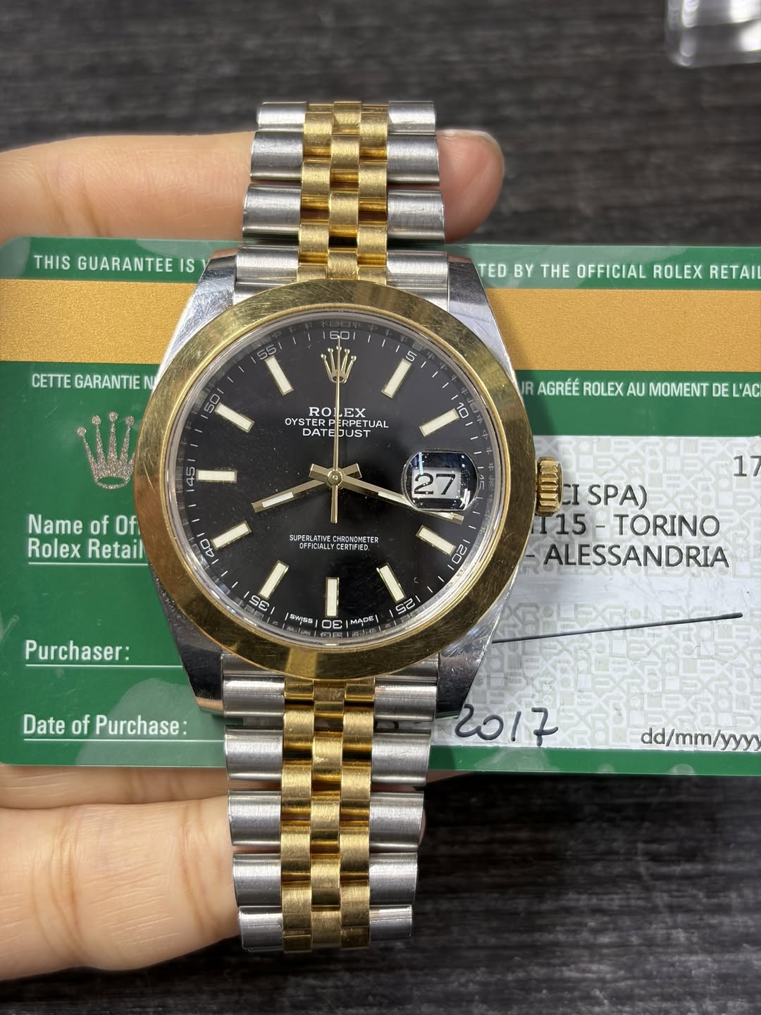 May be an image of wrist watch and text that says 'THIS GUARANTEE IS TED BY HE OFFICIAL ROLEX RETAI CETTE GARANTIE G0 55 5 50 RO EX OYS TERP ERPET FUSTURL UAL DATE DATEDUST 10…
