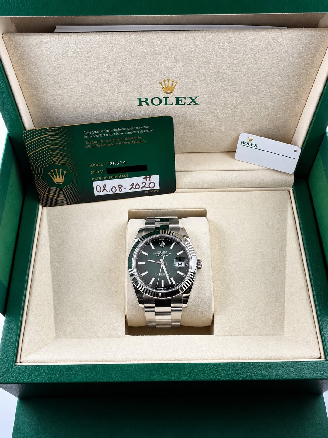May be an image of wrist watch and text that says 'لا ROLEX 126334 ማግ ROLEX የትቁ I F 6 i E เพิล'