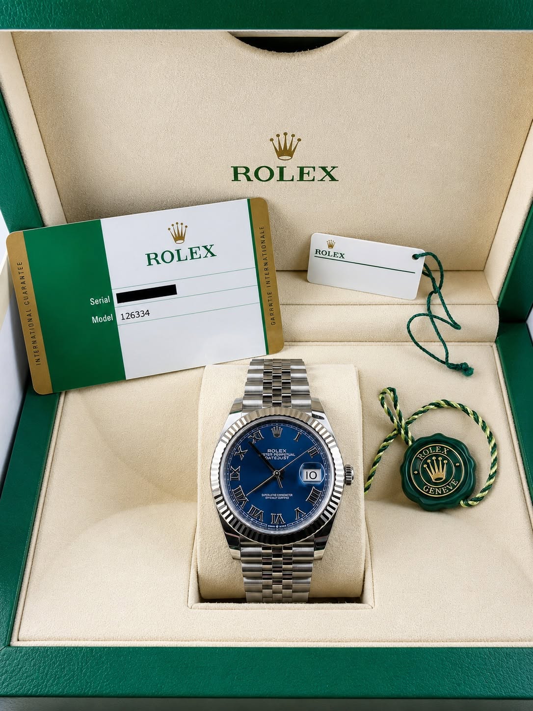 May be an image of wrist watch and text that says 'W ROLEX ROLEX ROLEX Serial Model 126334 иTAaam 10 MC WIT GENEV 5'