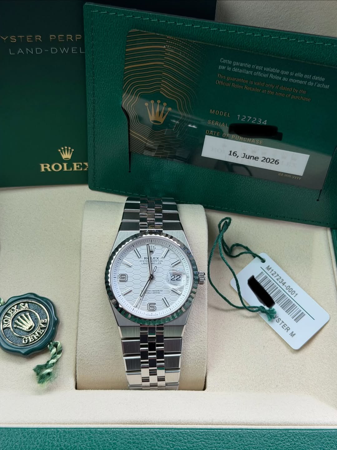 May be an image of wrist watch and text