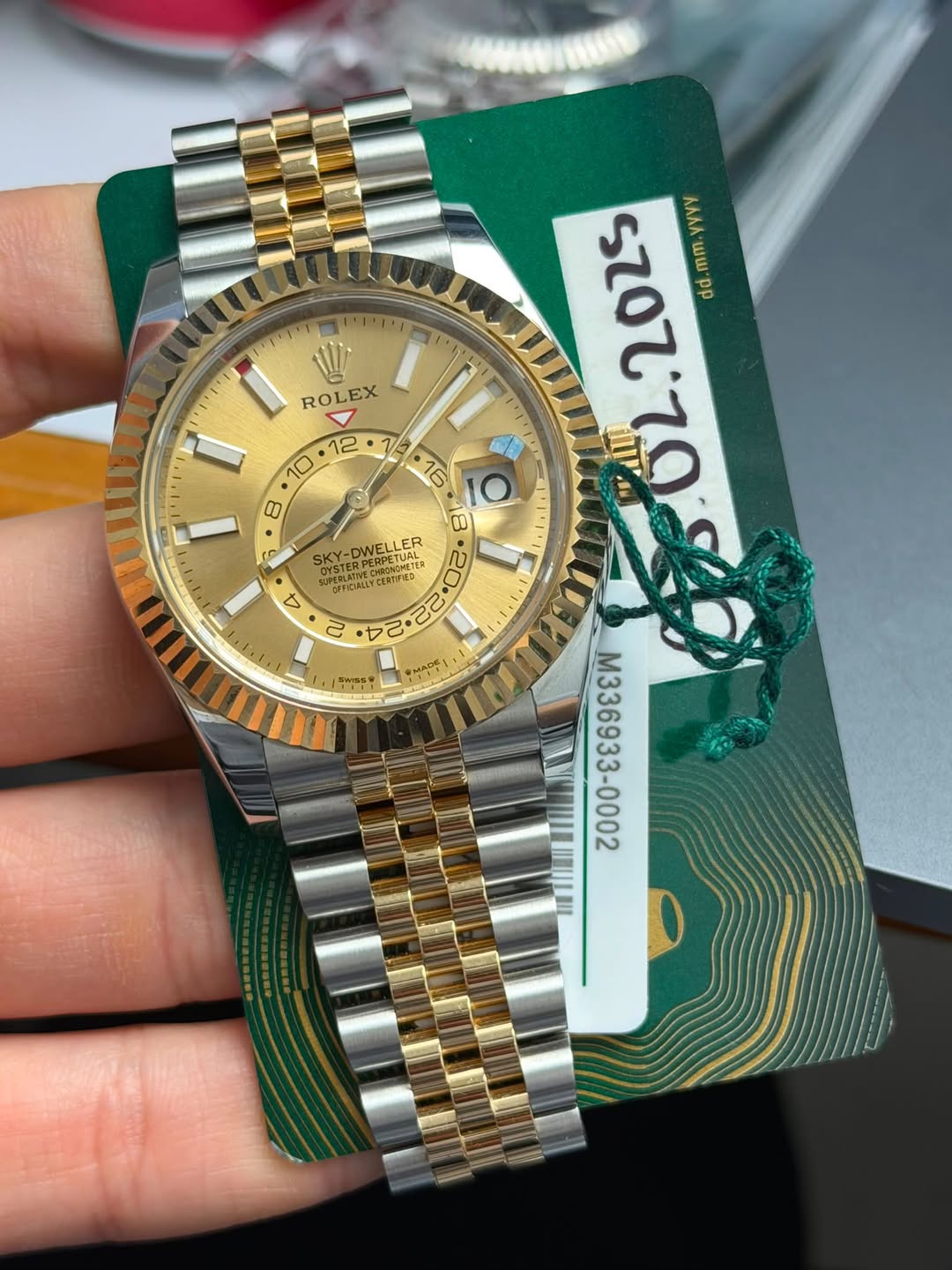 May be an image of wrist watch and text