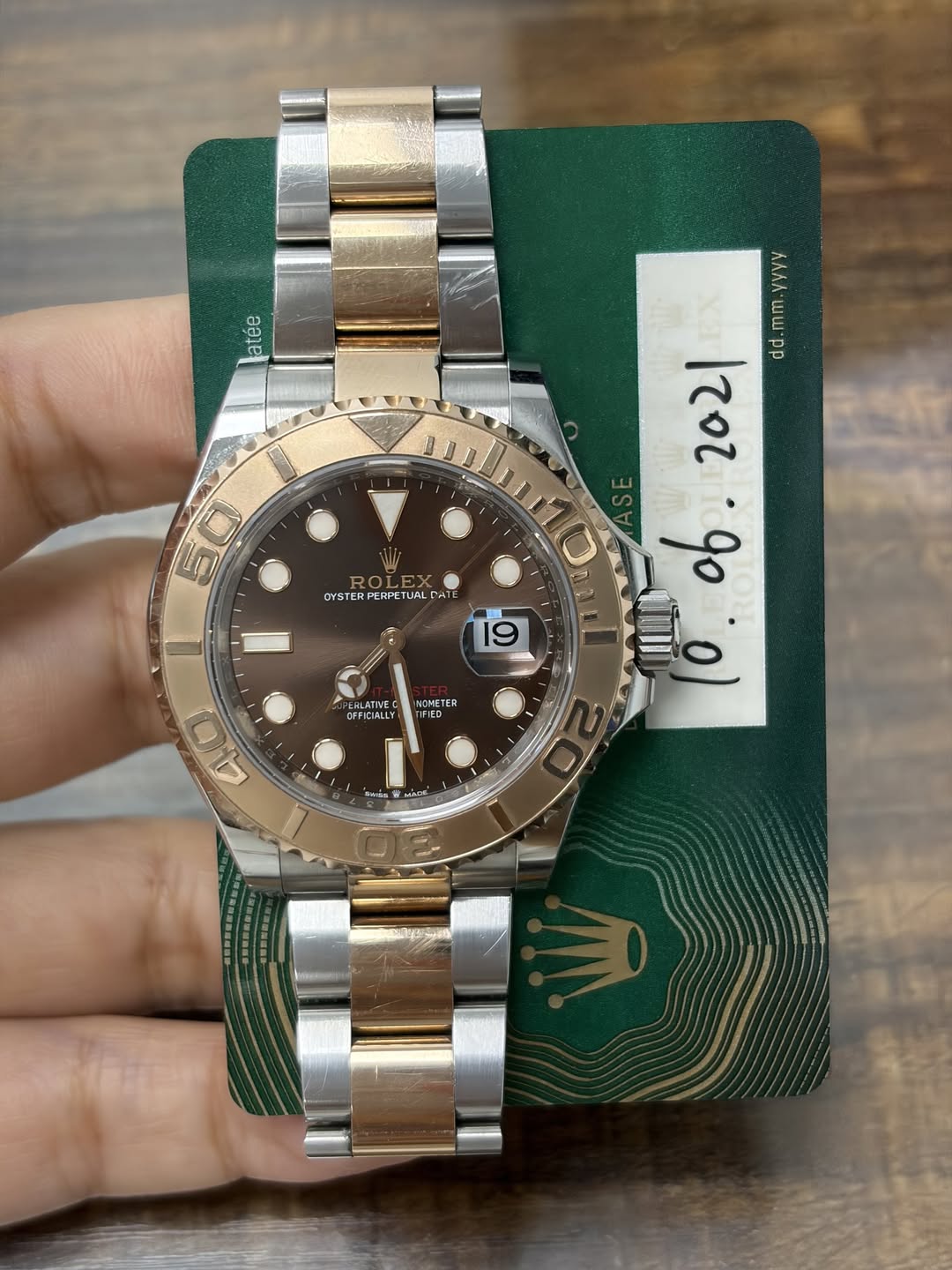 May be an image of wrist watch and text