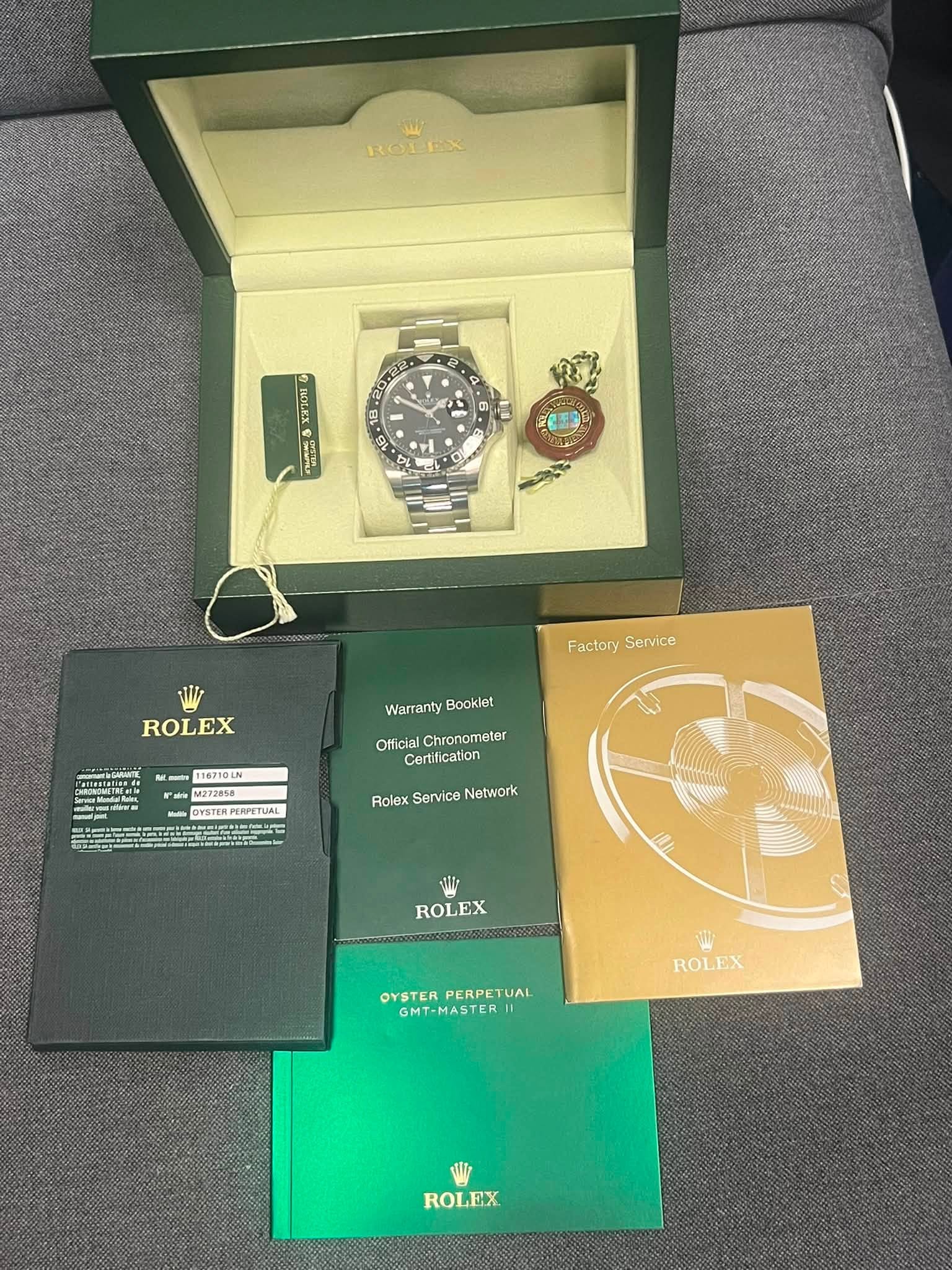 May be an image of wrist watch and text that says 'ROLEX X HOA รนาวน BEtO Factory Service ROLEX -55NITSN Warranty Booklet geag OfficialChronometer Official Chronometer…