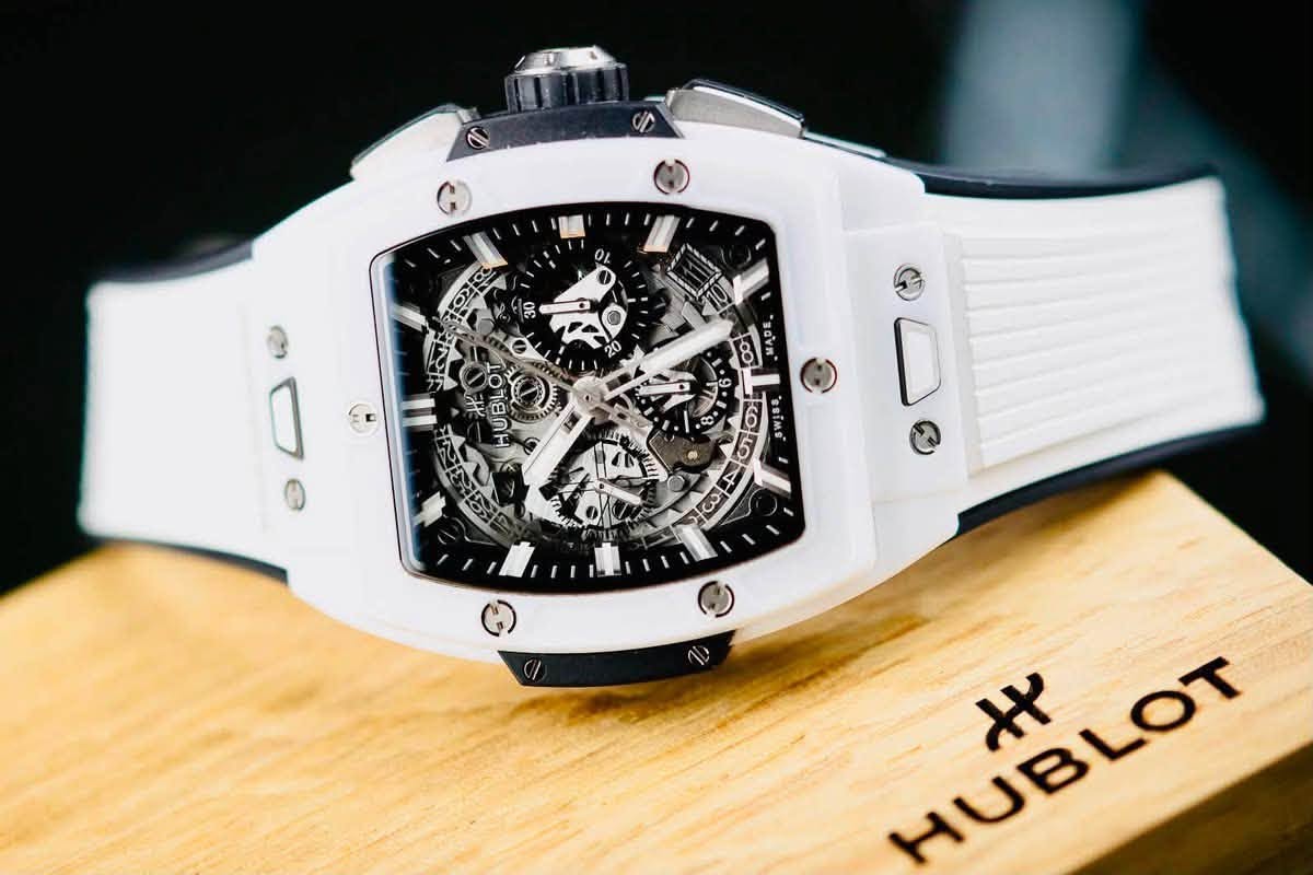 May be an image of wrist watch and text