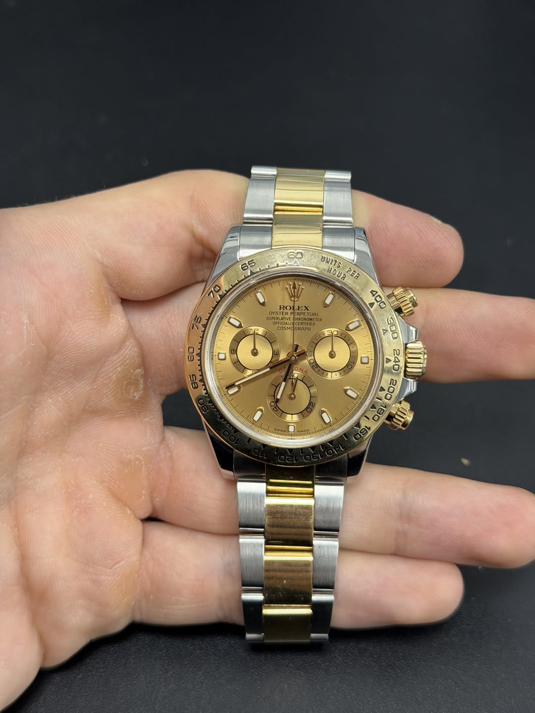 May be an image of wrist watch and text
