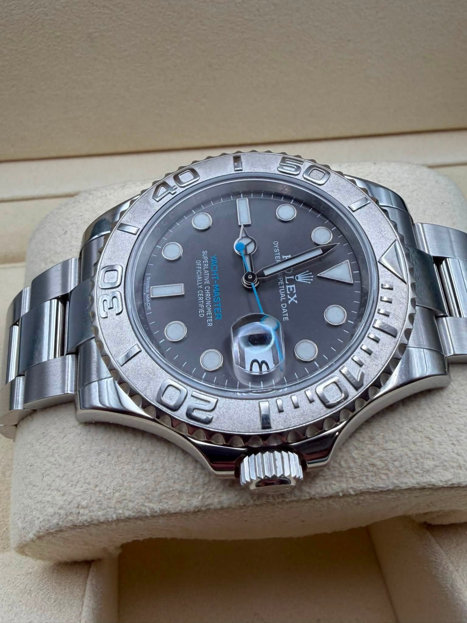 May be an image of wrist watch and text