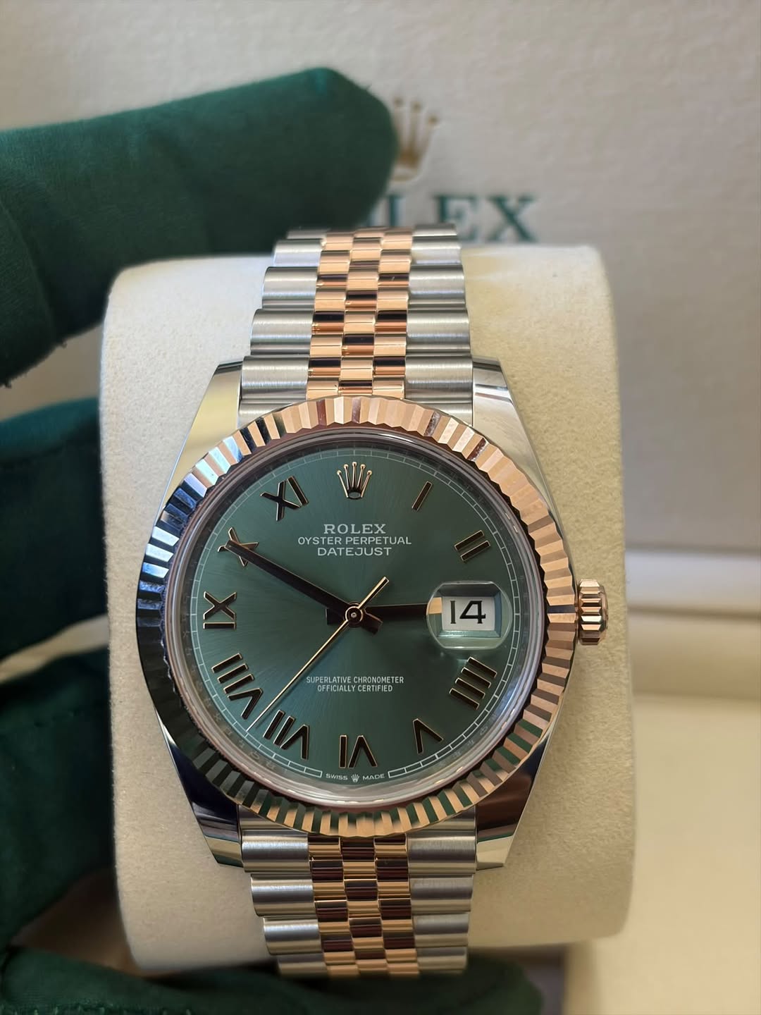May be an image of wrist watch and text