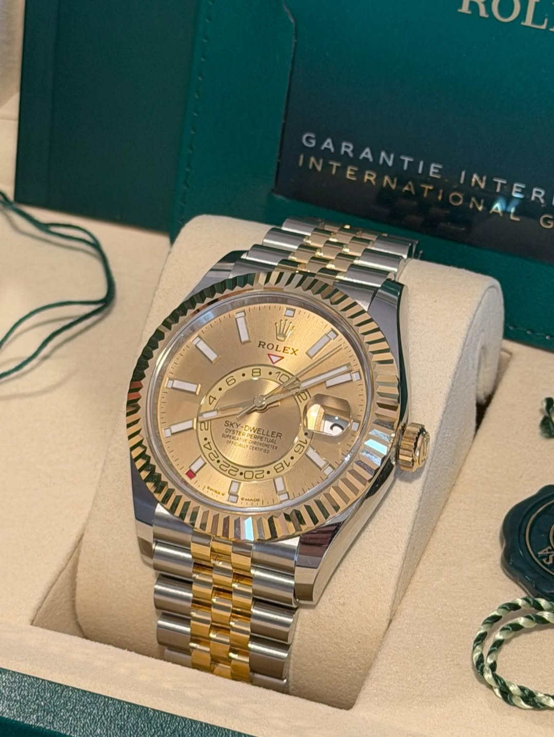 May be an image of wrist watch and text