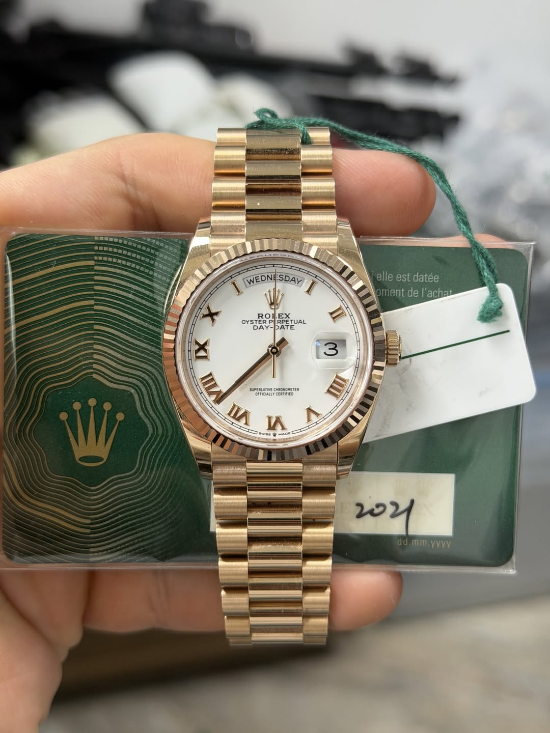 May be an image of wrist watch and text