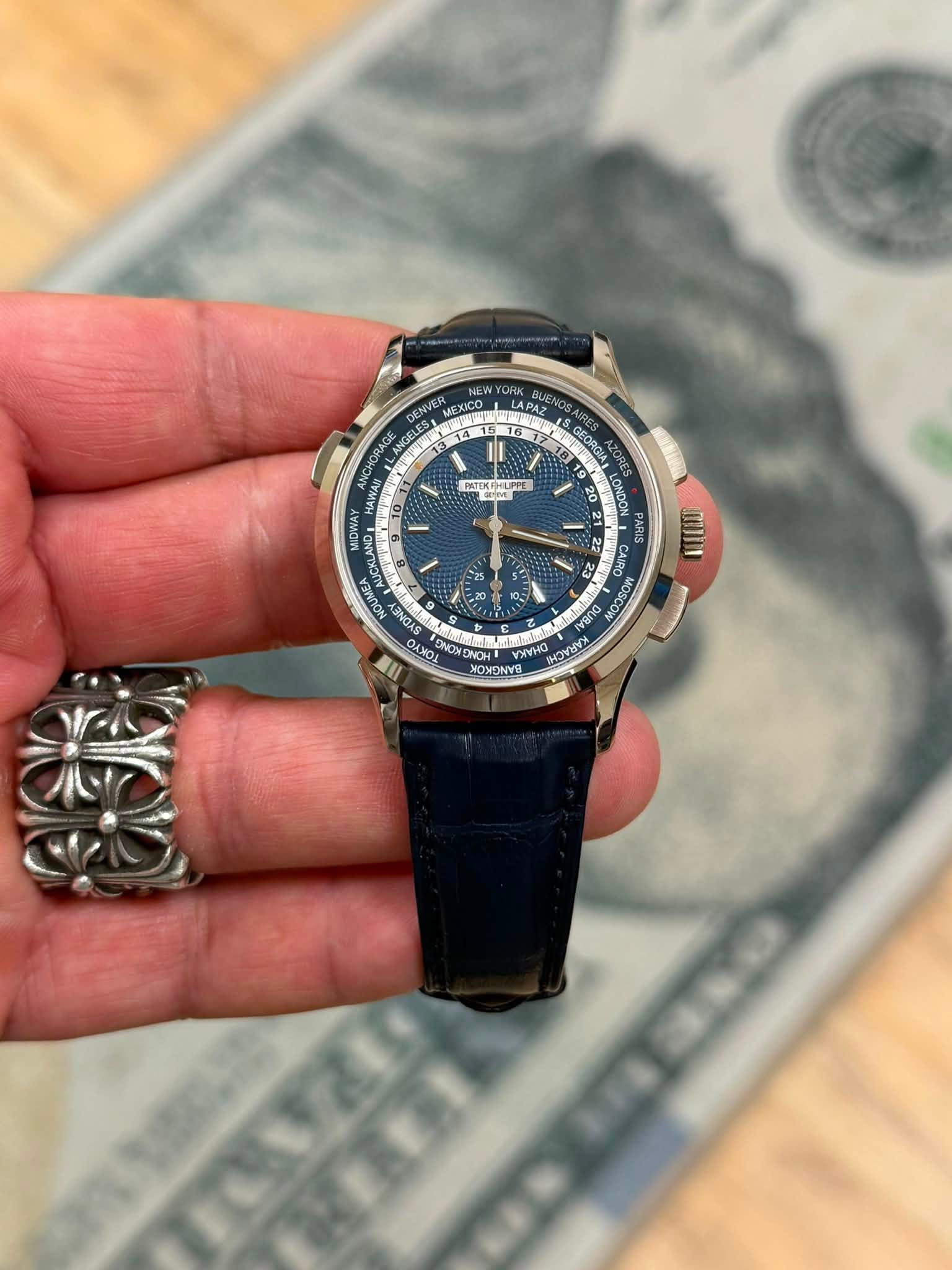 May be an image of wrist watch and text